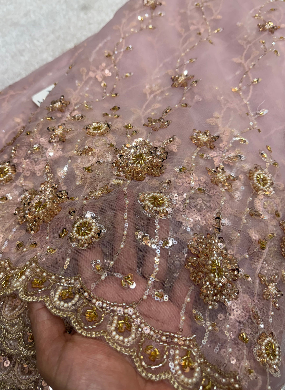 Embroidered net fabric