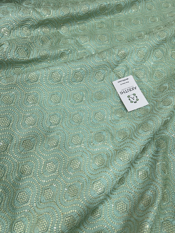 Heavy Embroidery on sea green raw silk fabric