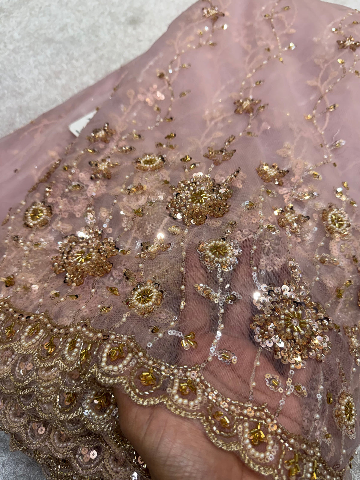 Embroidered net fabric