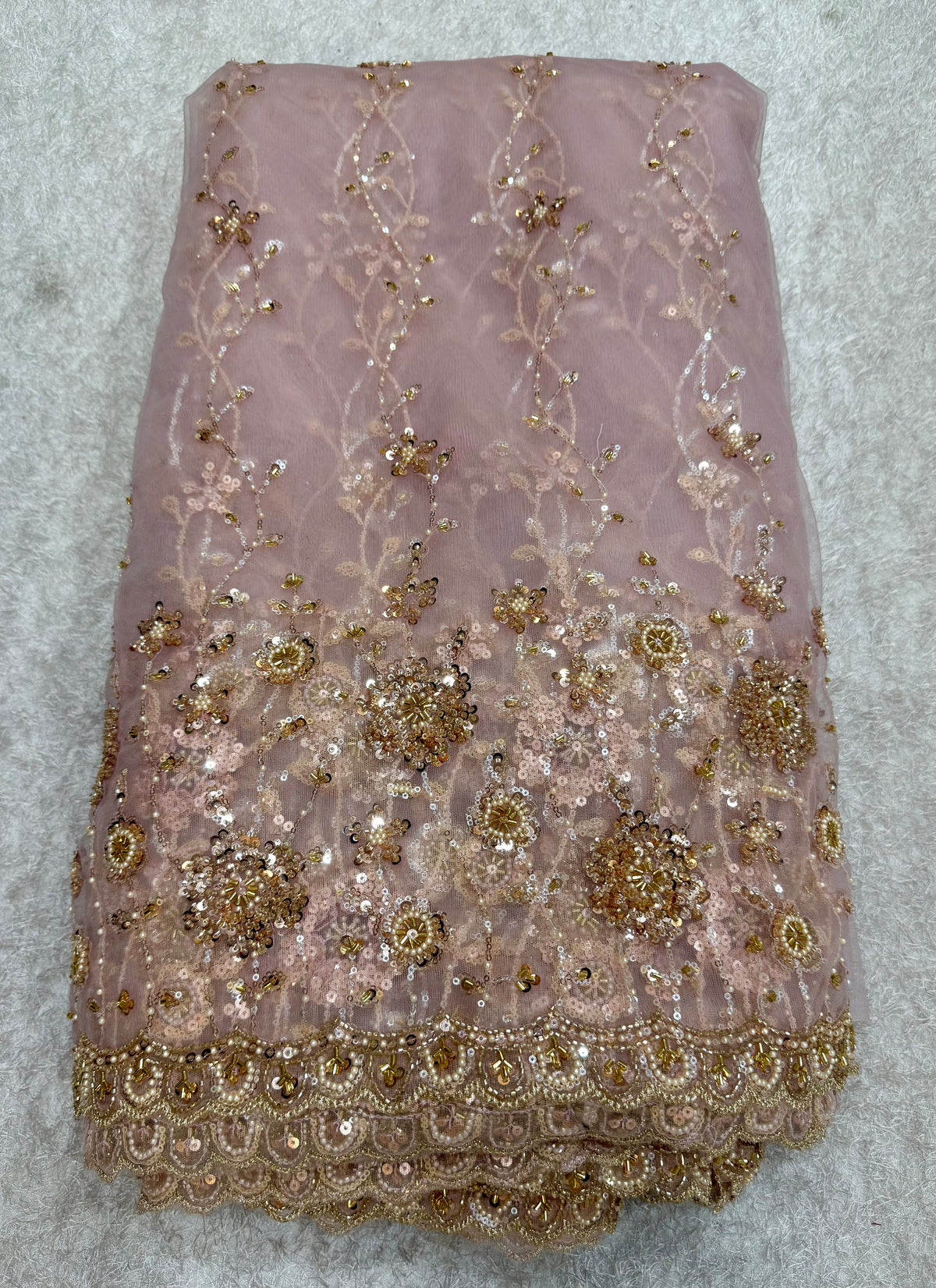 Embroidered net fabric