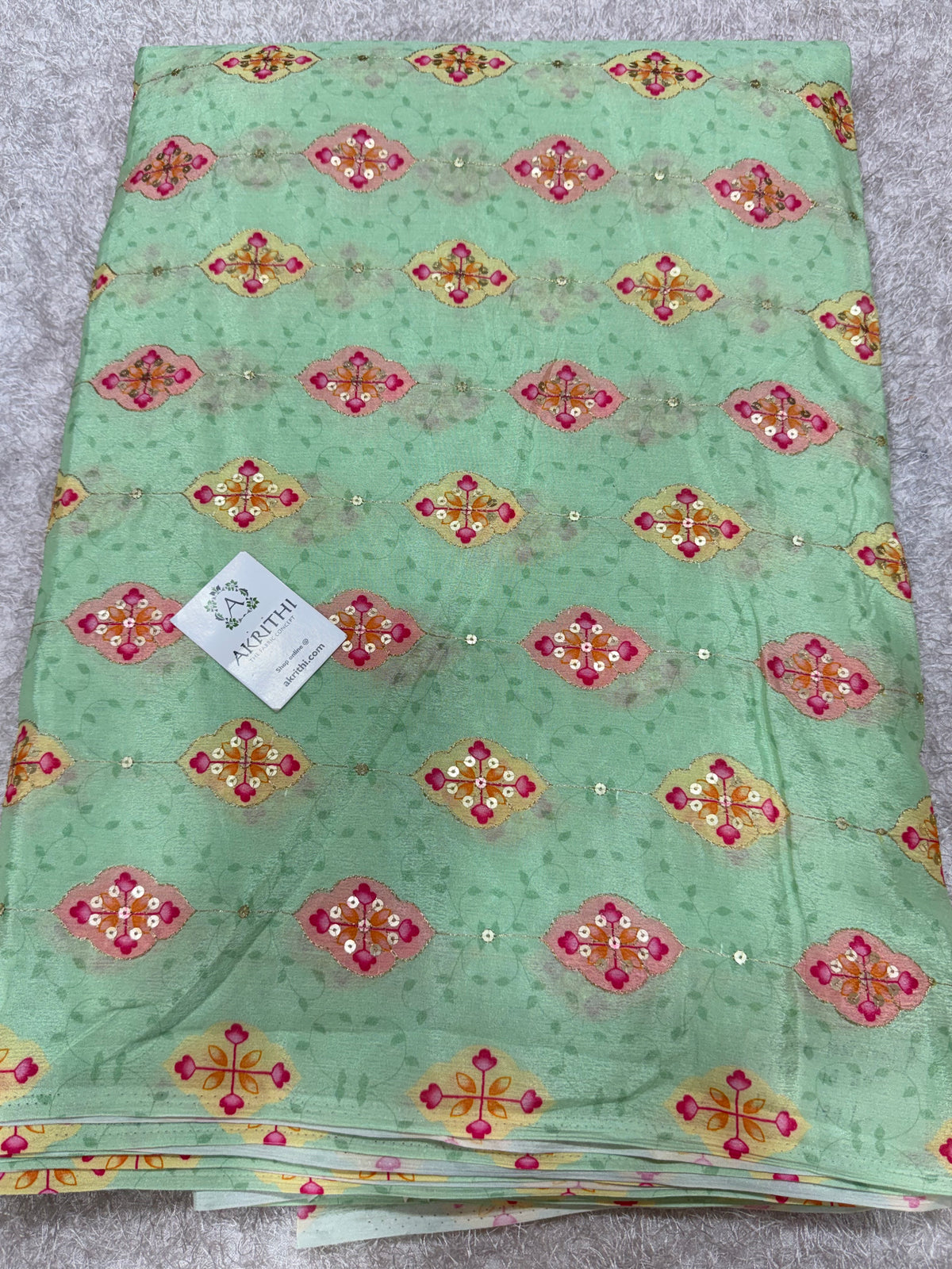 Embroidered chinon fabric With position print