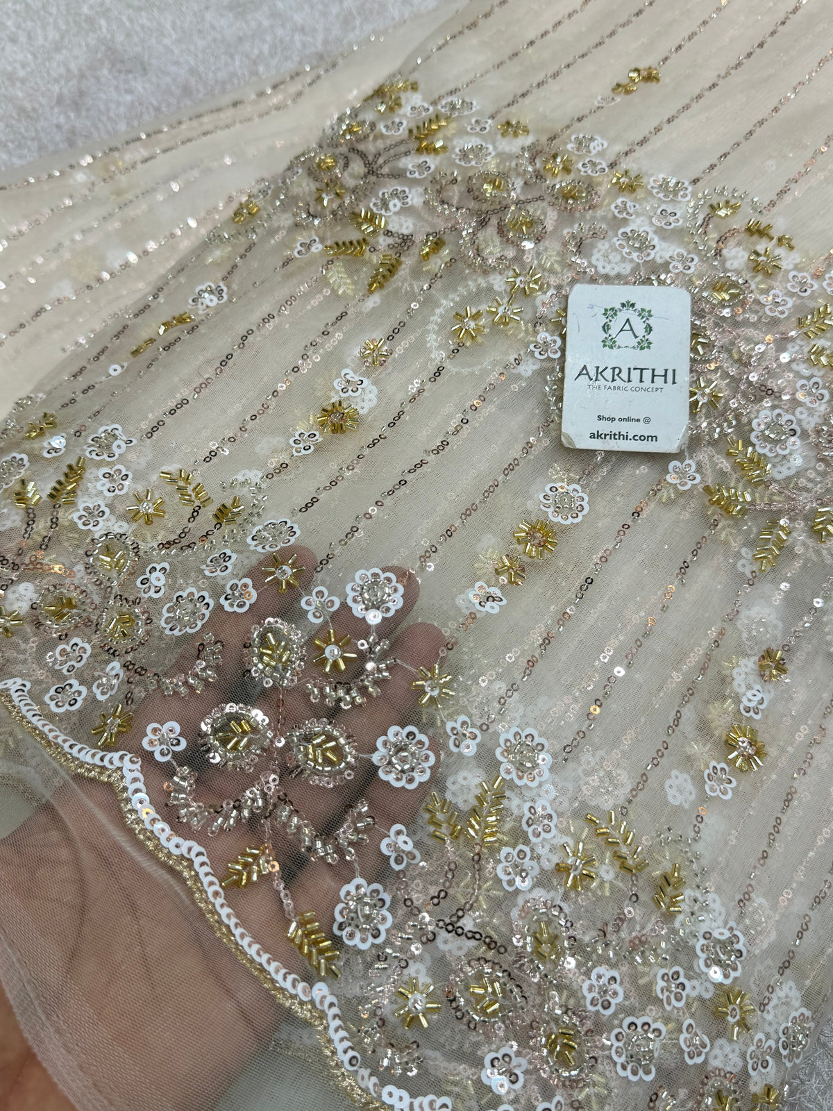 Embroidered net fabric