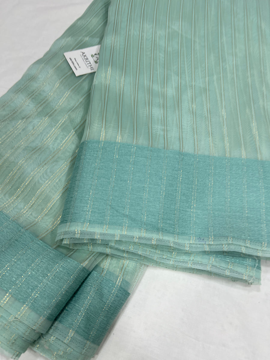 Woven organza fabric with border