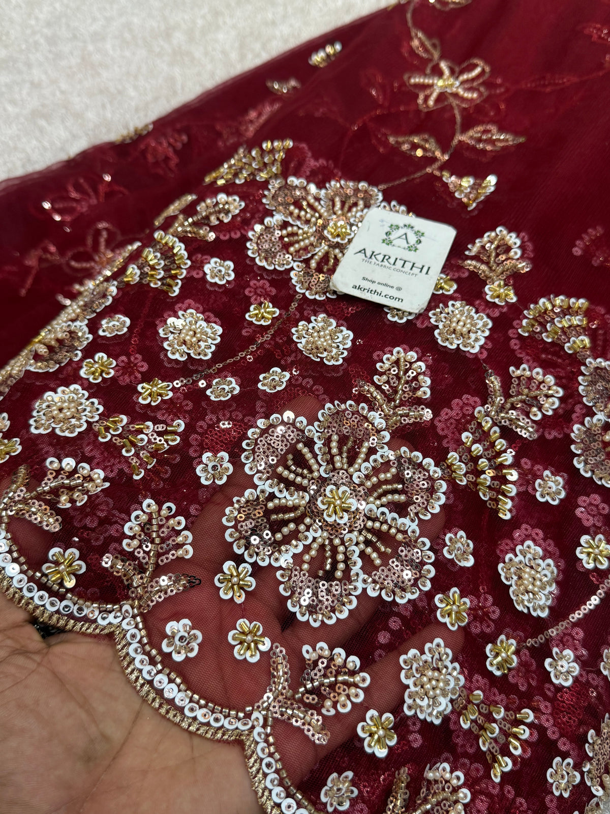 Embroidered net fabric