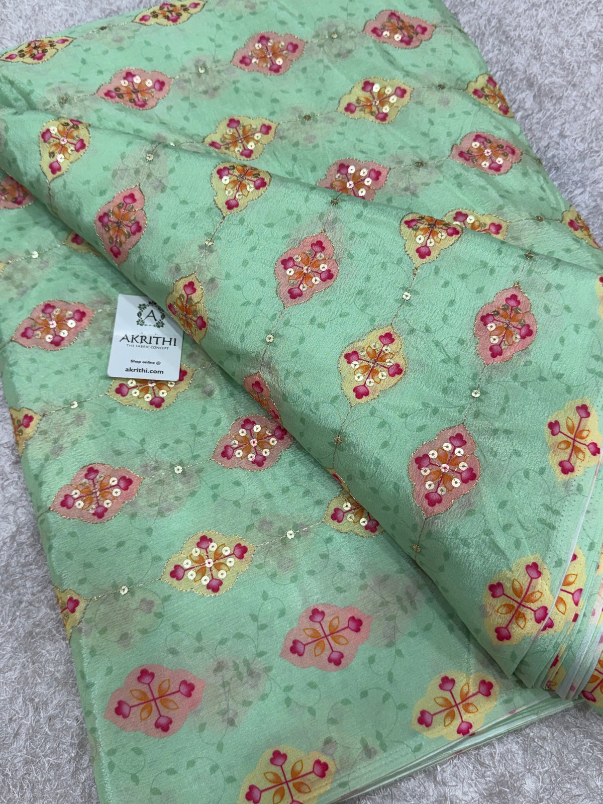 Embroidered chinon fabric With position print