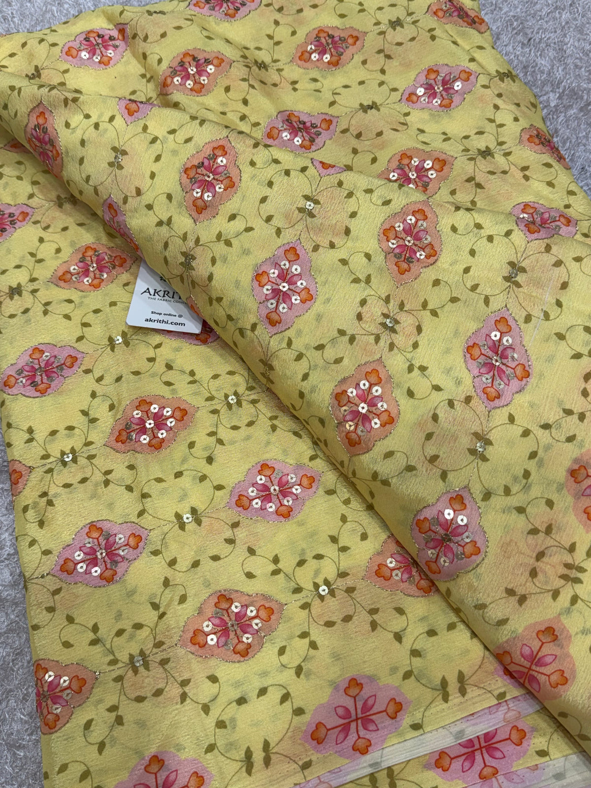 Embroidered chinon fabric With position print