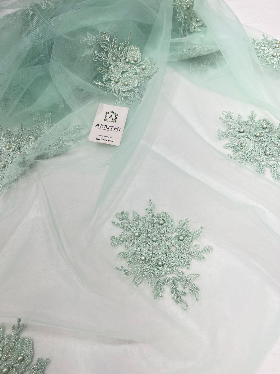 Embroidered net fabric