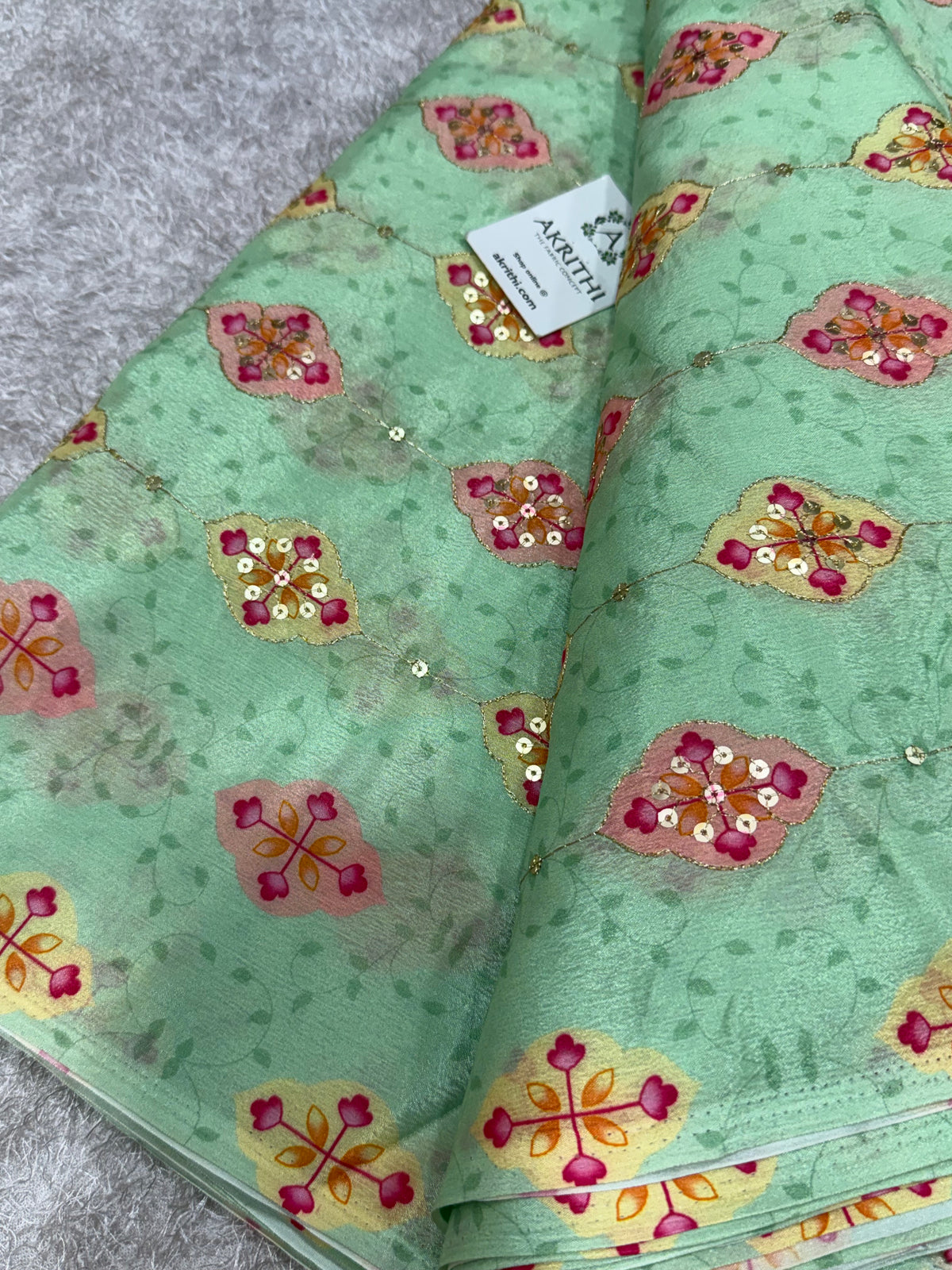 Embroidered chinon fabric With position print
