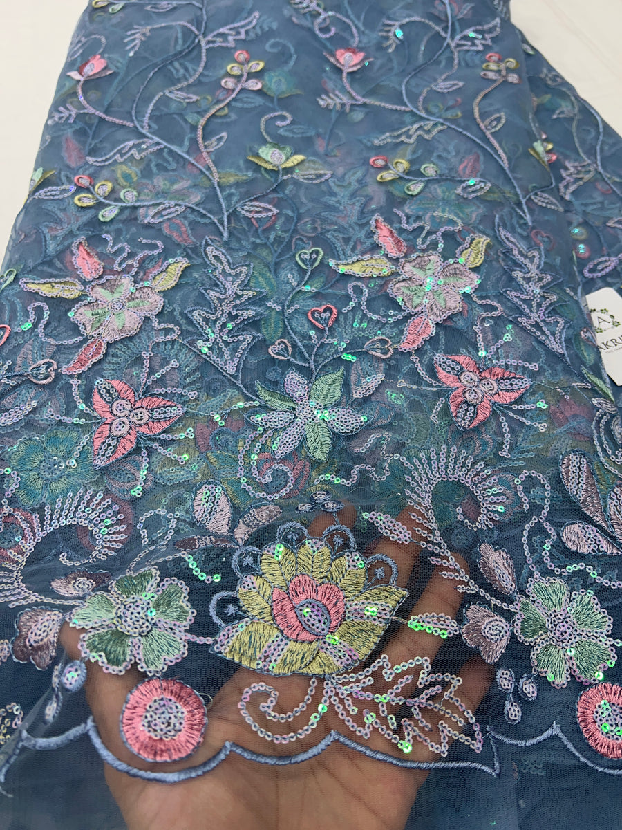 Embroidered net fabric