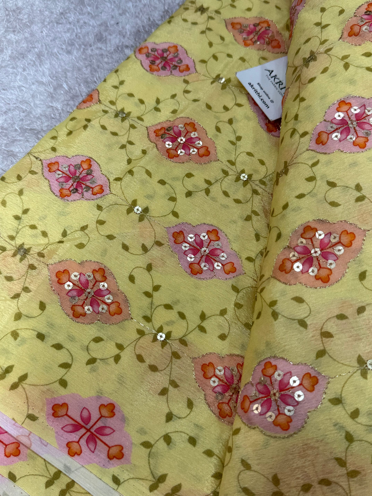Embroidered chinon fabric With position print