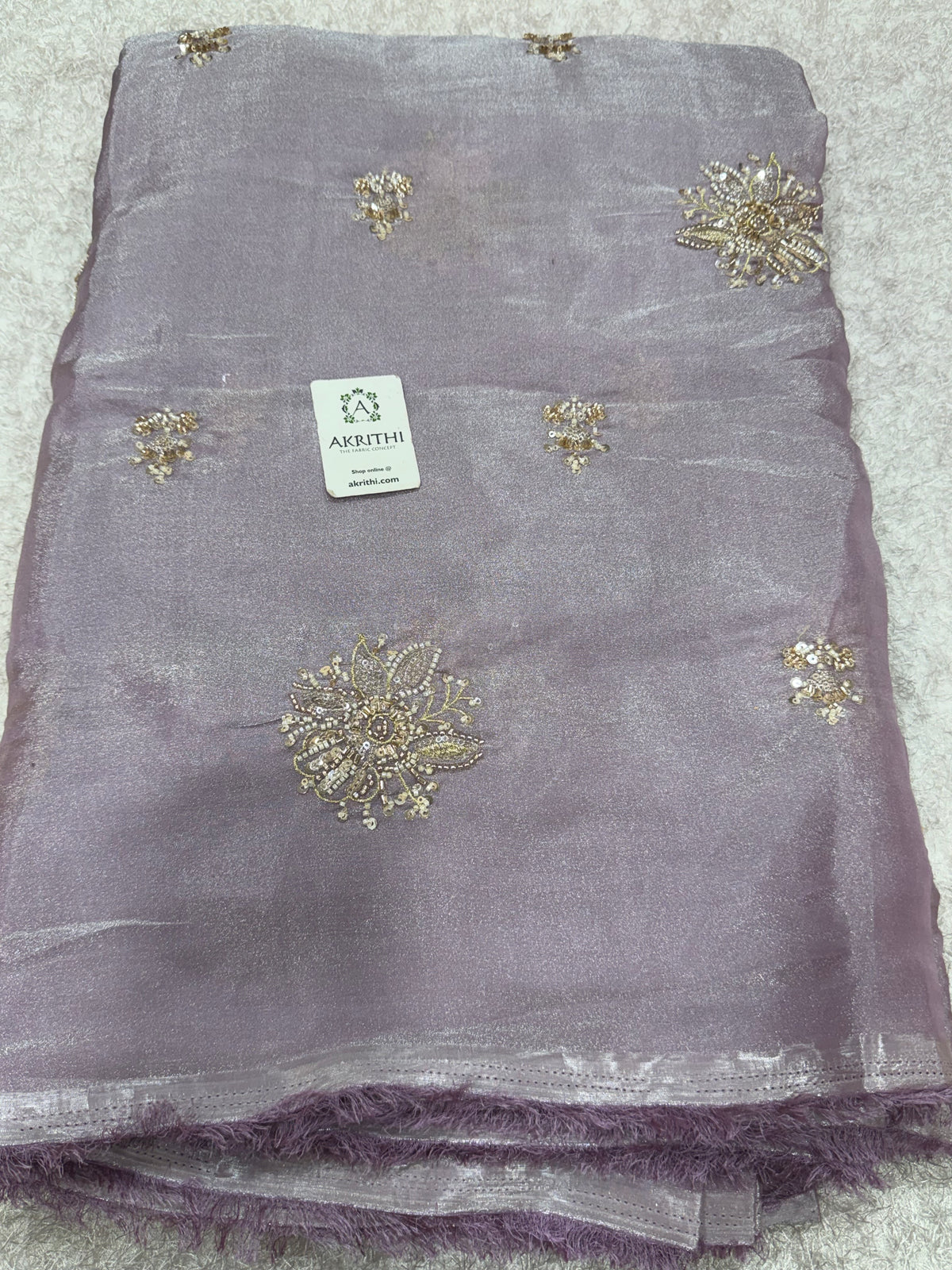 Embroidered shimmer glass organza fabric