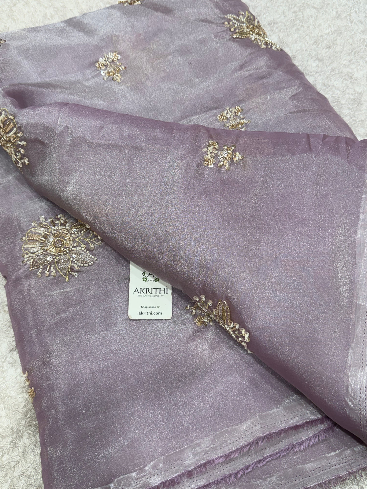 Embroidered shimmer glass organza fabric