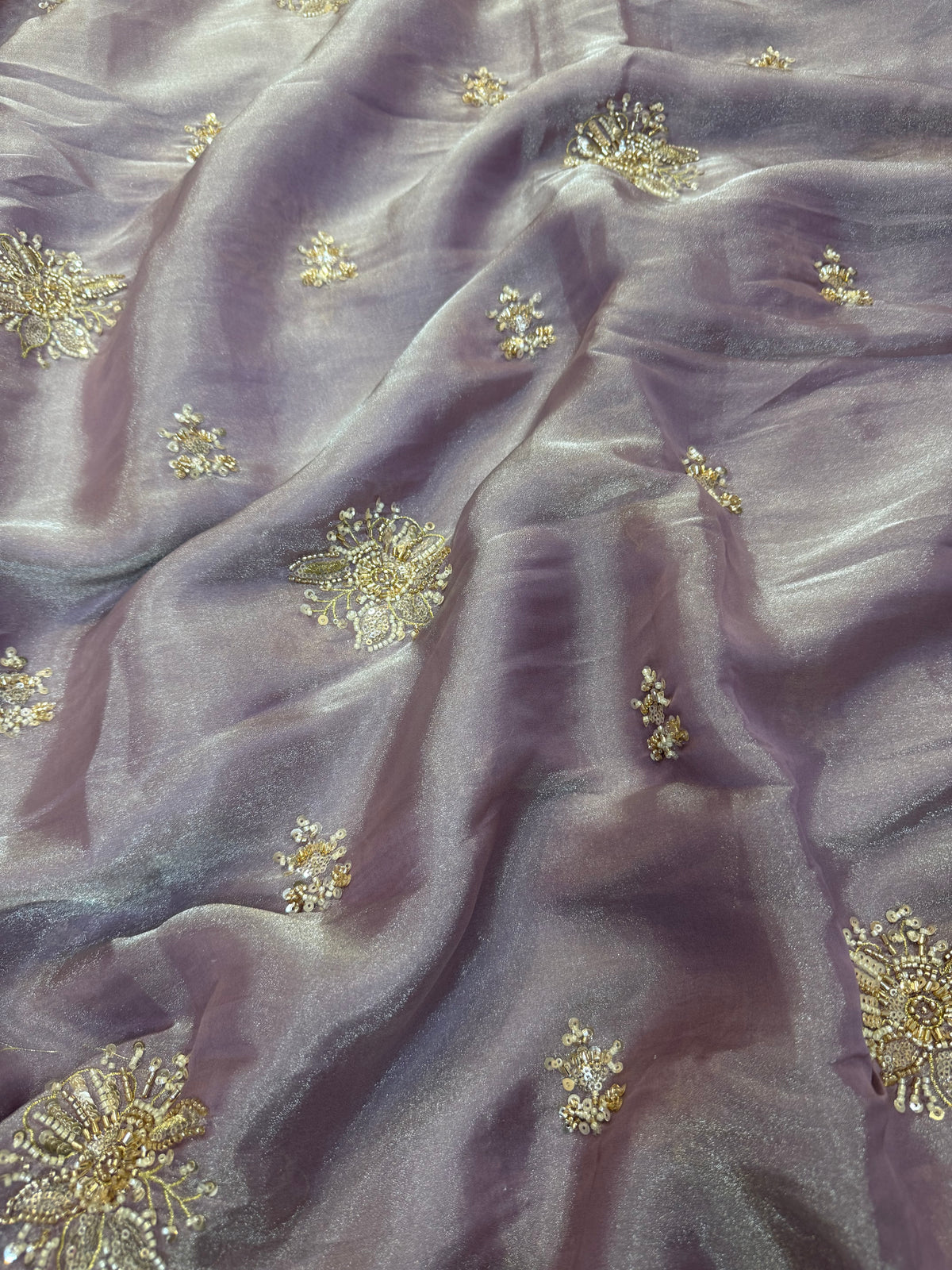 Embroidered shimmer glass organza fabric