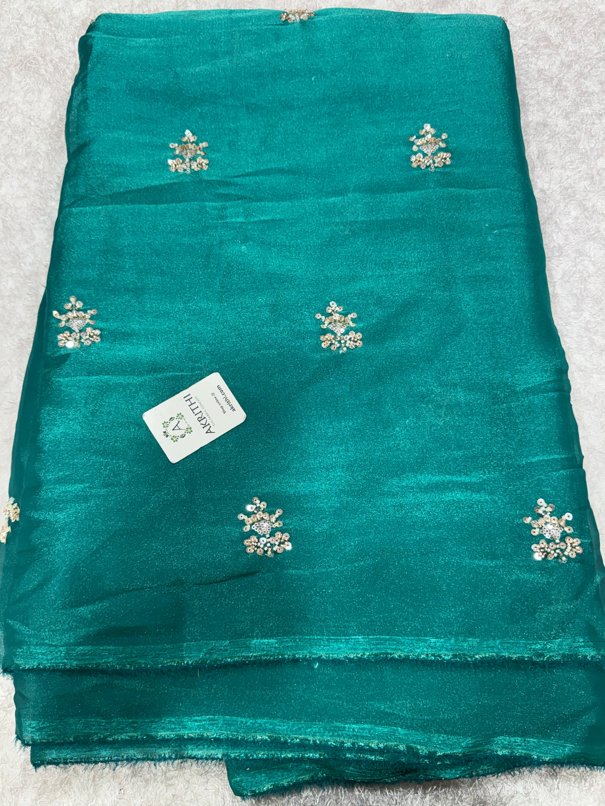 Embroidered shimmer glass organza fabric
