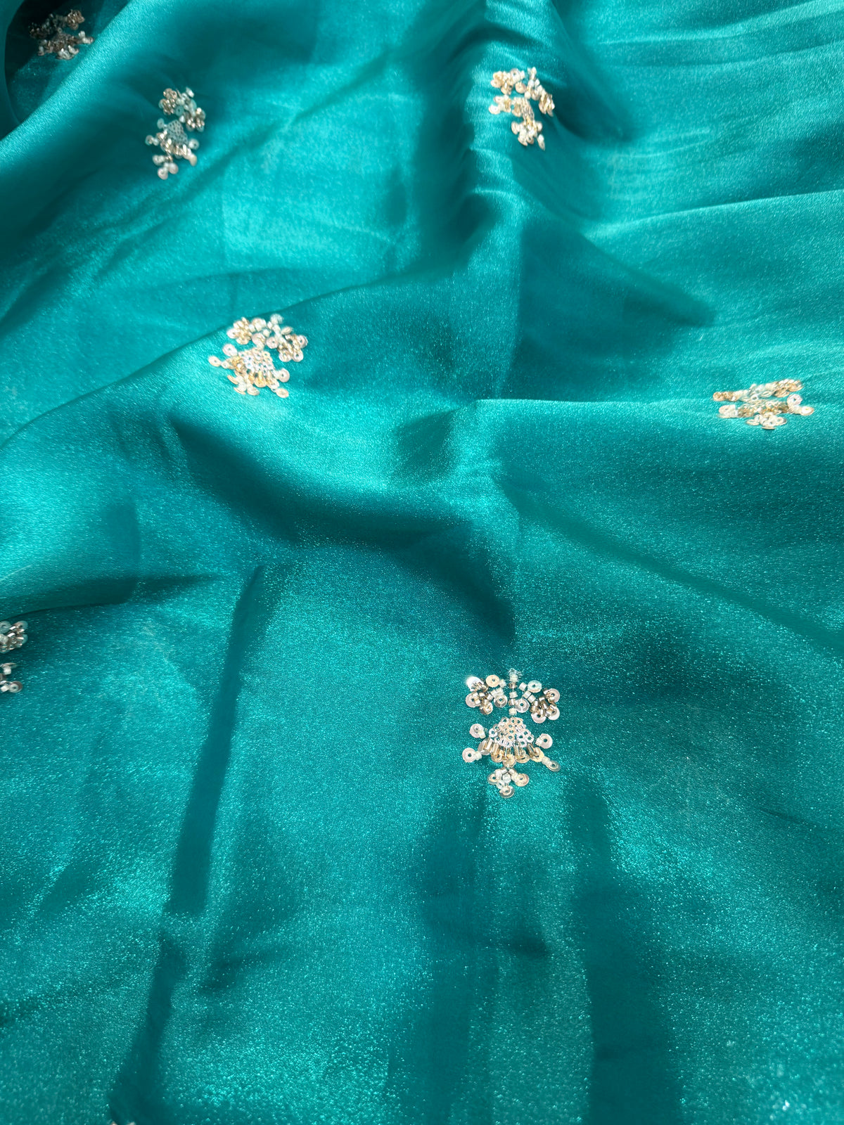 Embroidered shimmer glass organza fabric