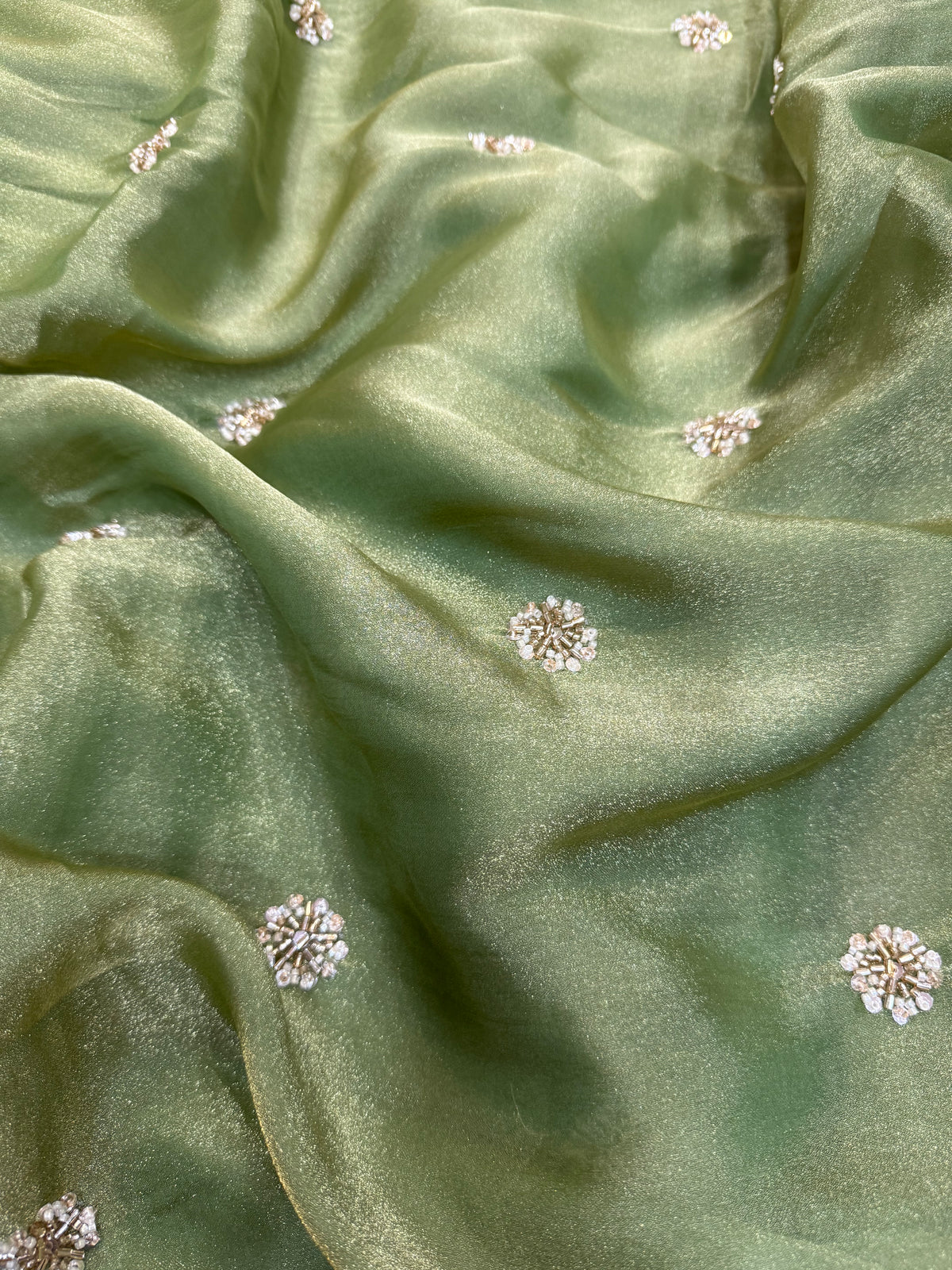 Embroidered shimmer glass organza fabric
