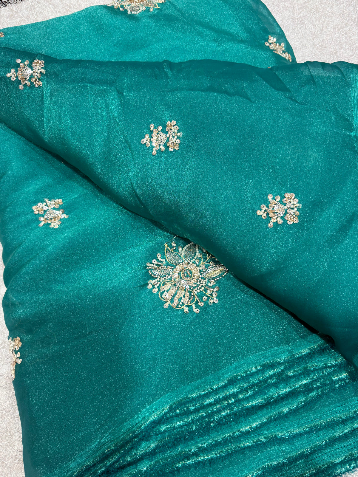 Embroidered shimmer glass organza fabric
