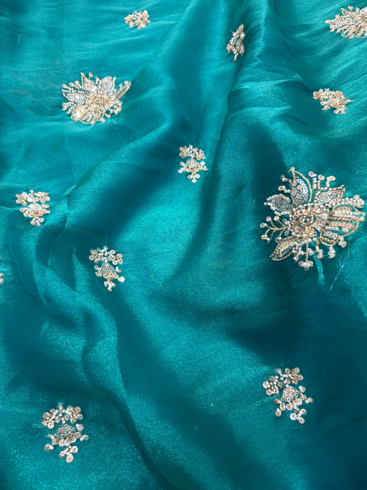 Embroidered shimmer glass organza fabric