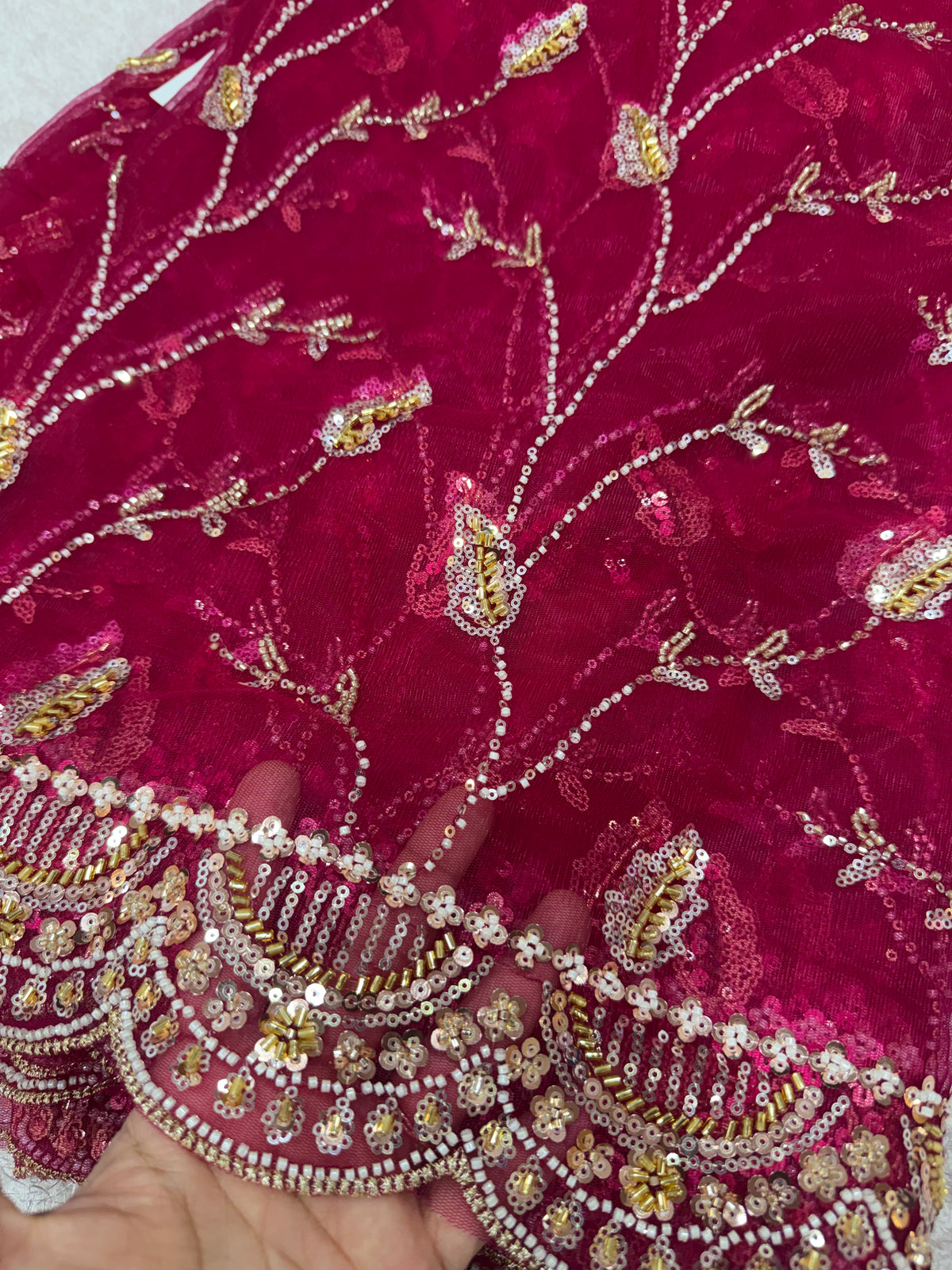 Embroidered net fabric