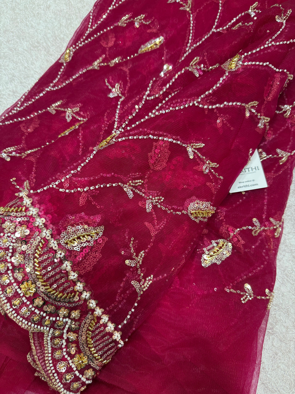 Embroidered net fabric