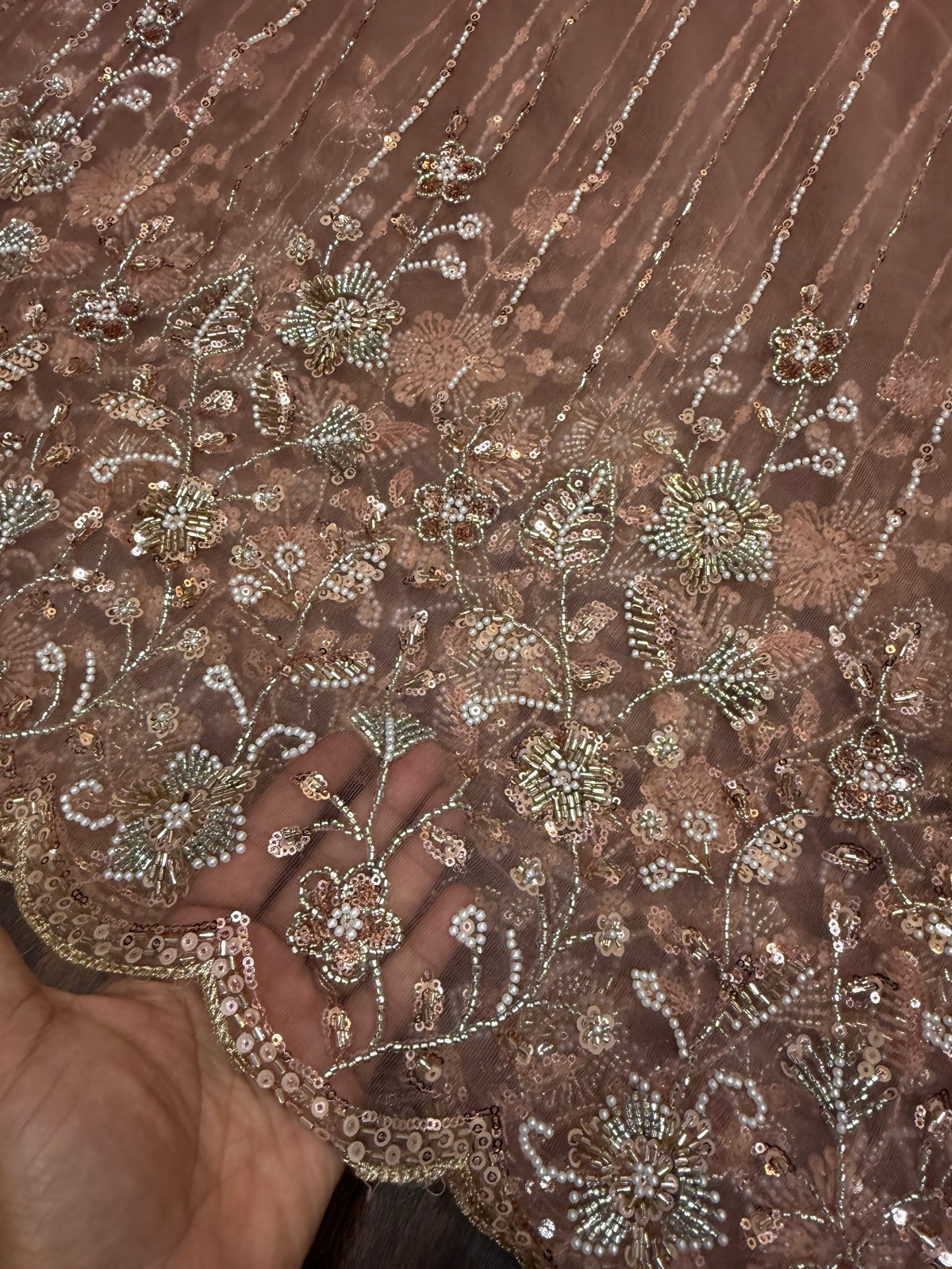 Embroidered net fabric