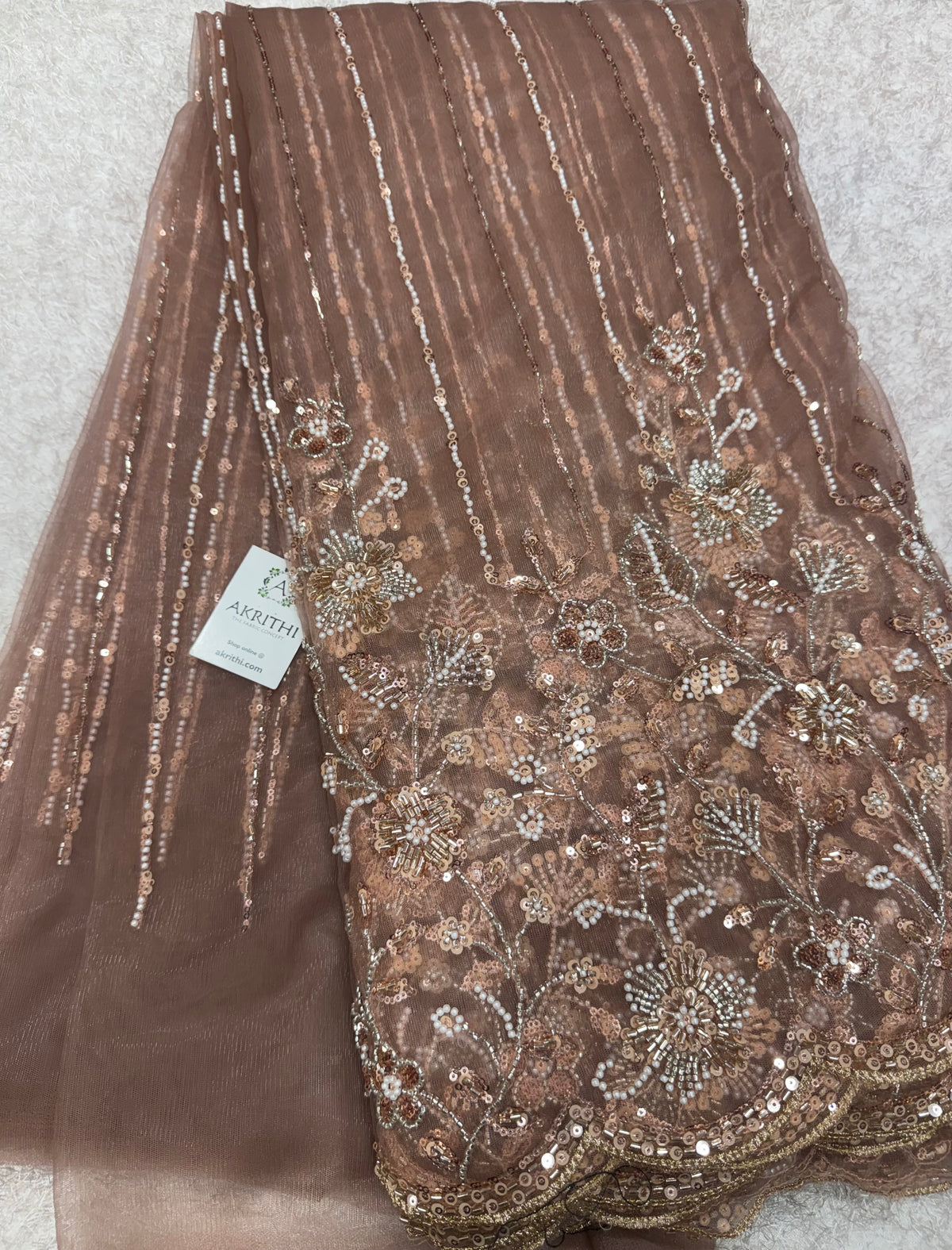 Embroidered net fabric