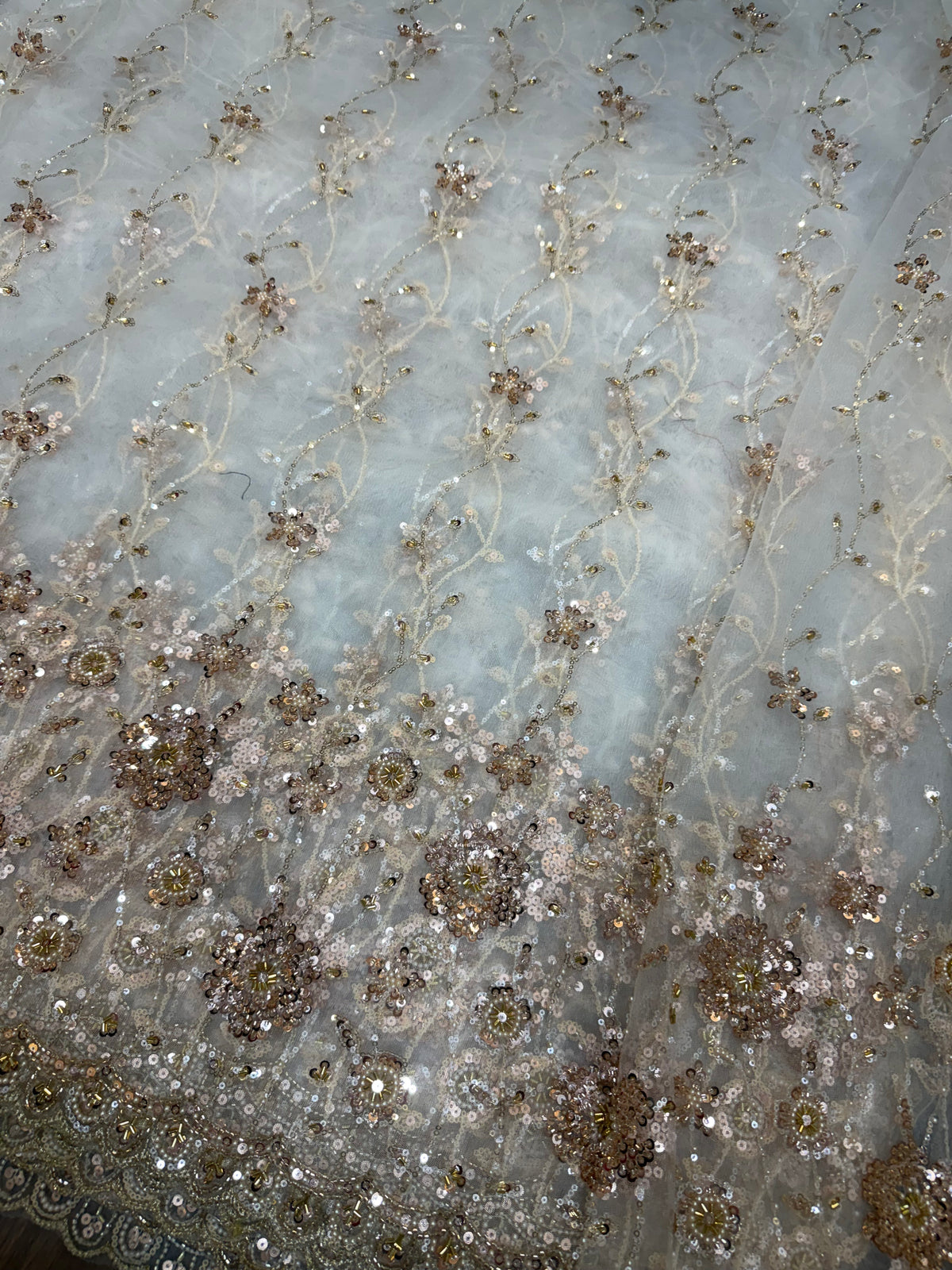 Embroidered net fabric