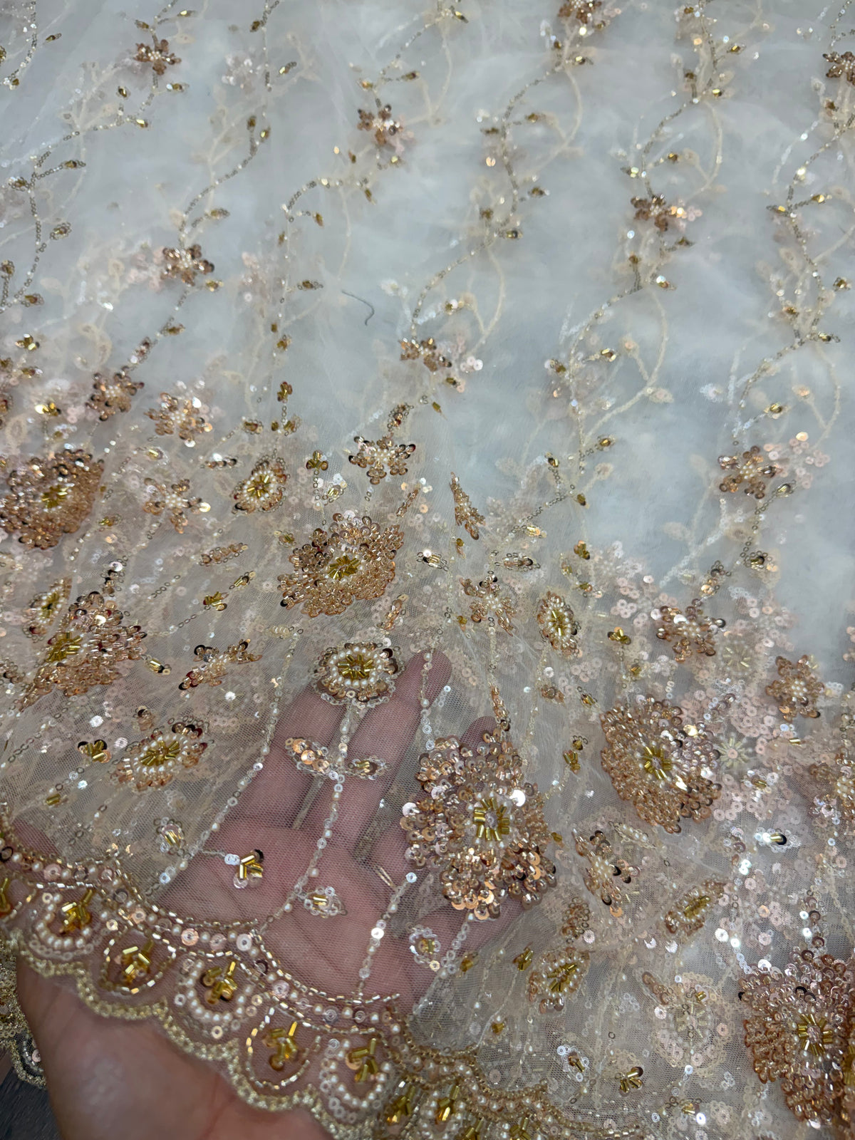 Embroidered net fabric