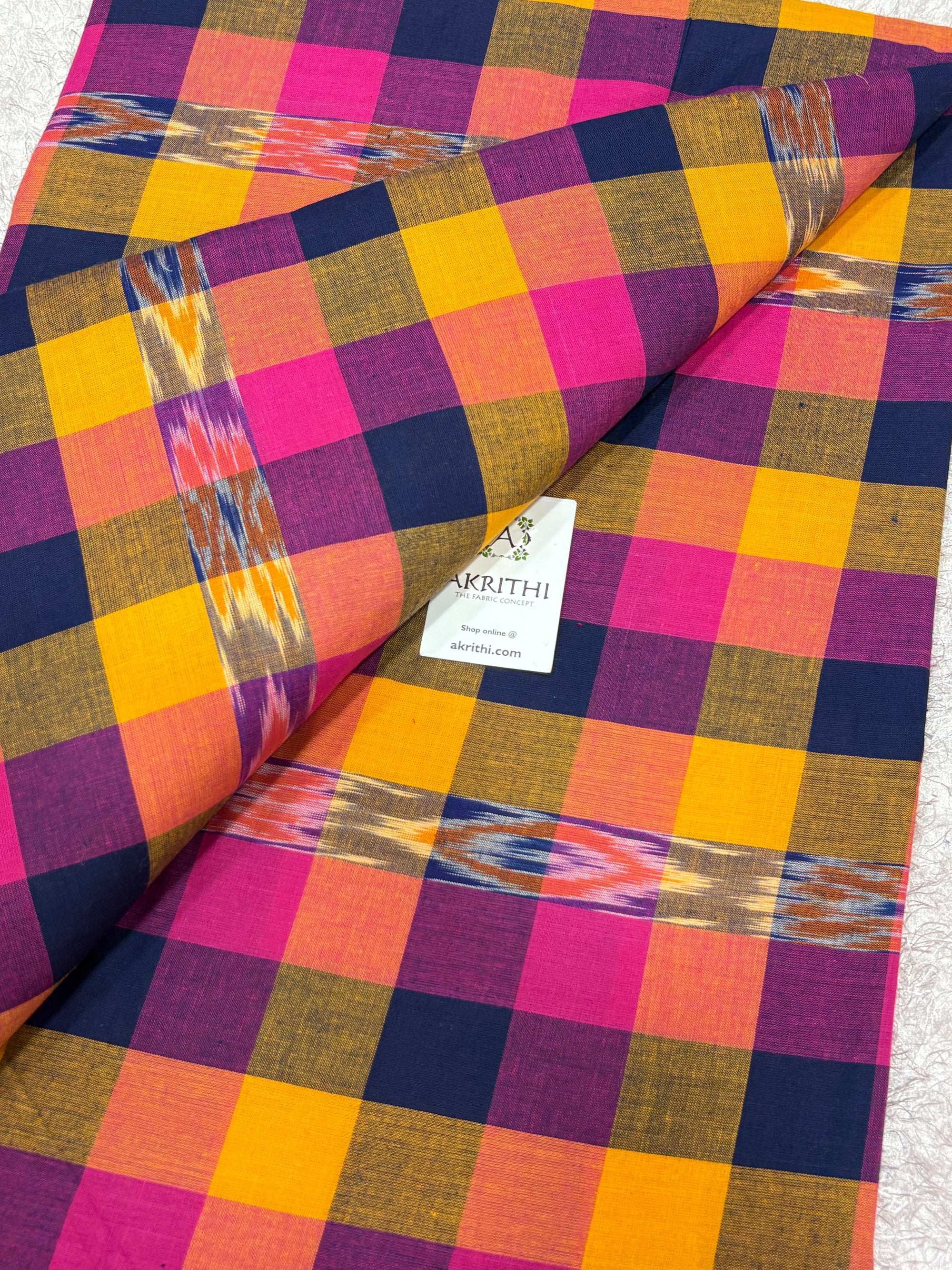 Ikat woven Madras checks pure cotton fabric