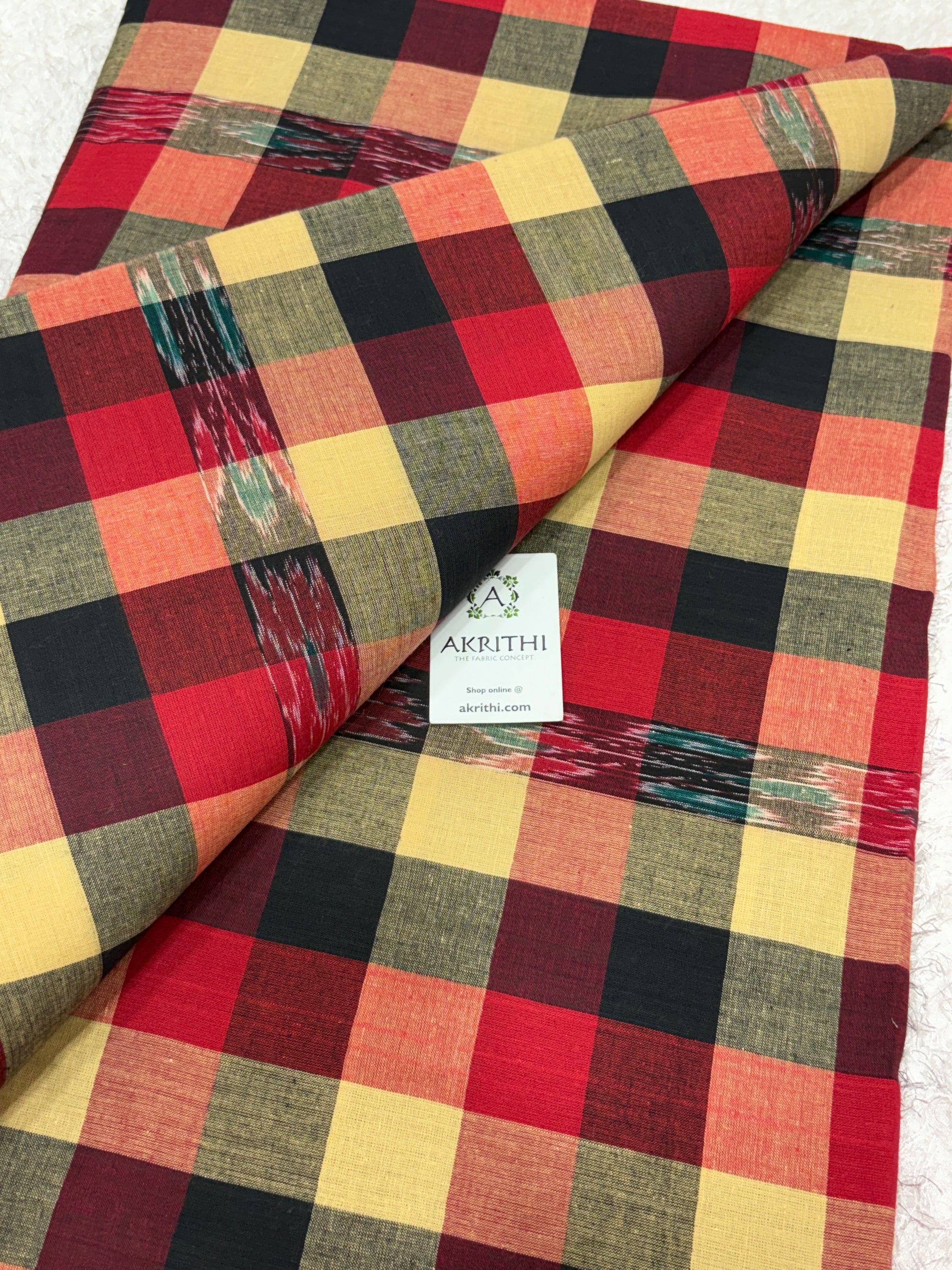 Ikat woven Madras checks pure cotton fabric