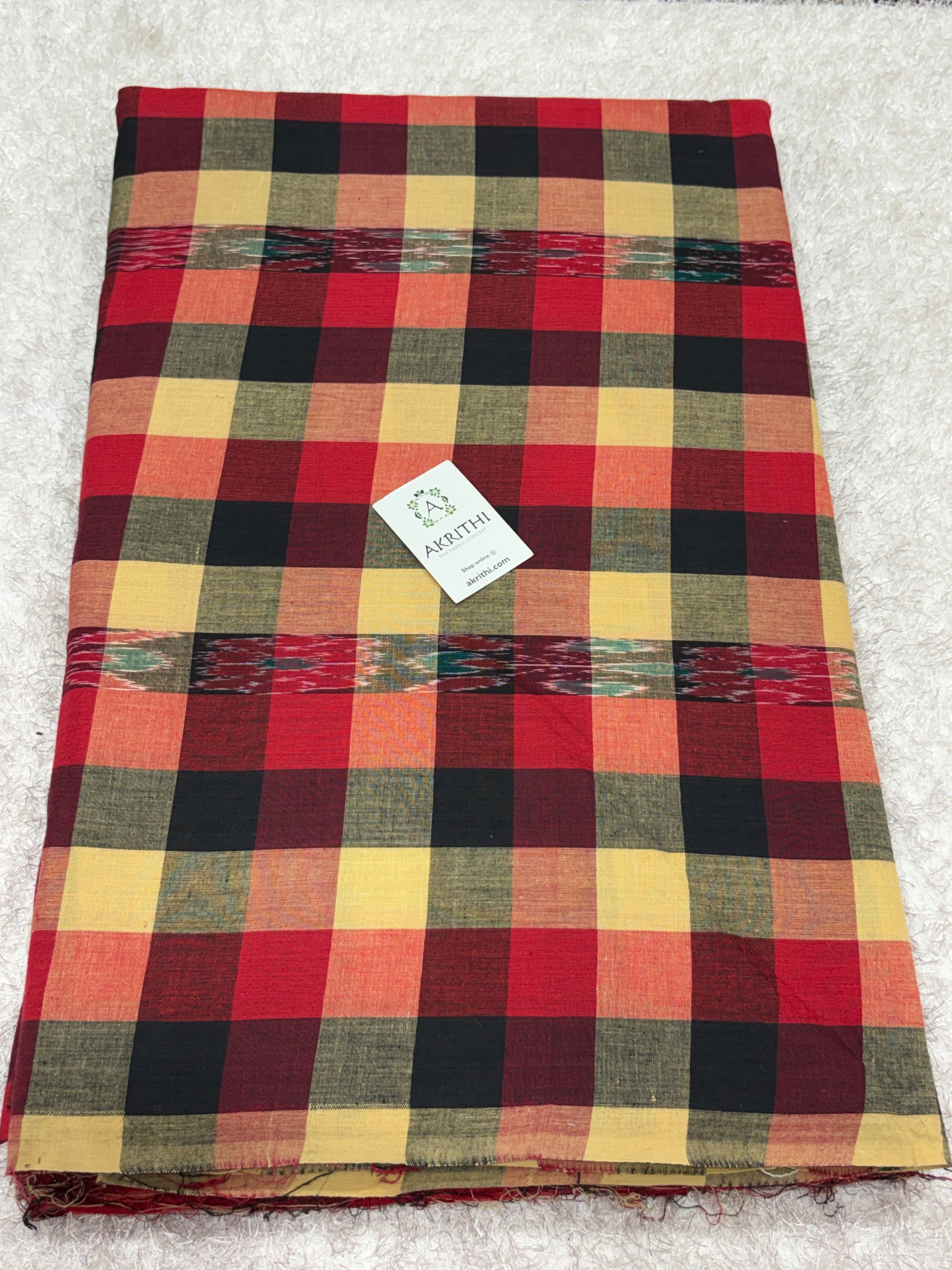 Ikat woven Madras checks pure cotton fabric