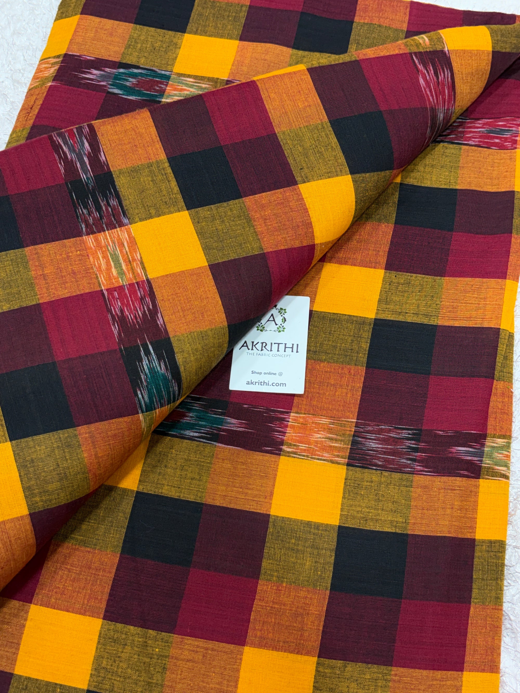 Ikat woven Madras checks pure cotton fabric
