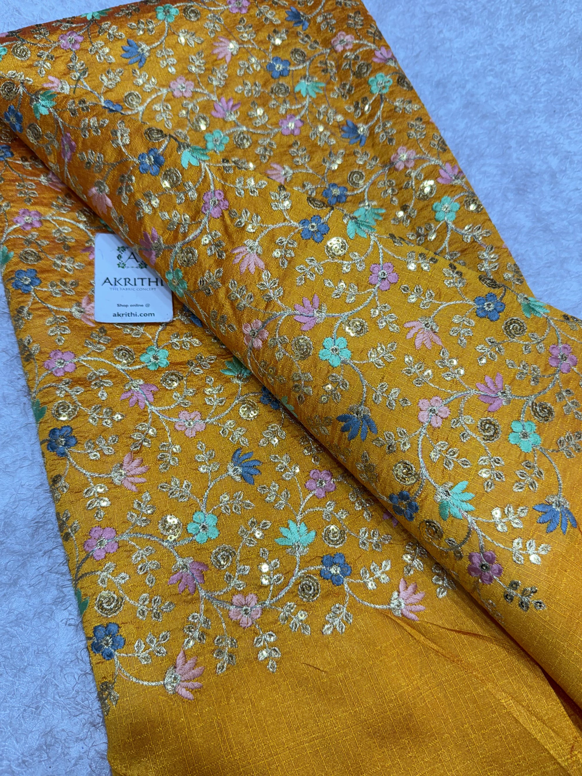 Embroidered Raw silk fabric