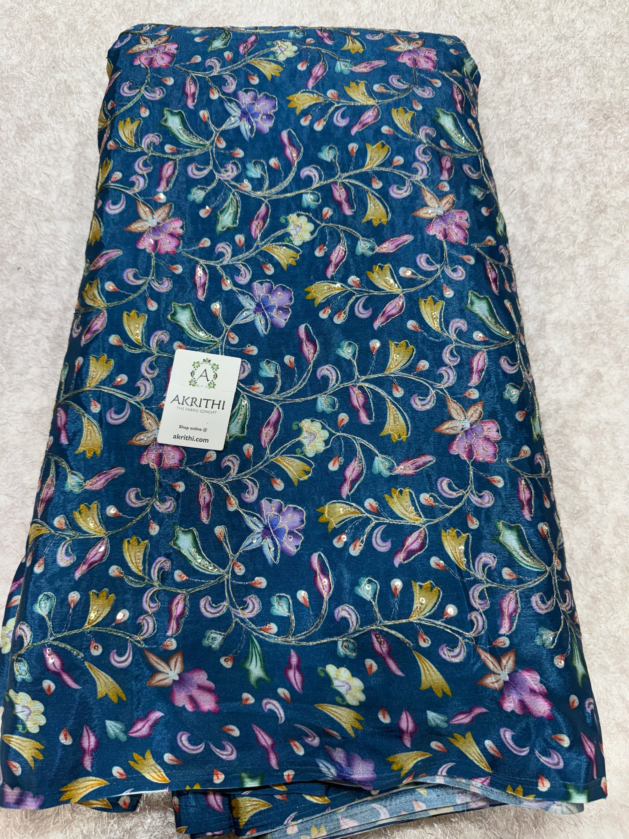 Embroidered chinon fabric With position print