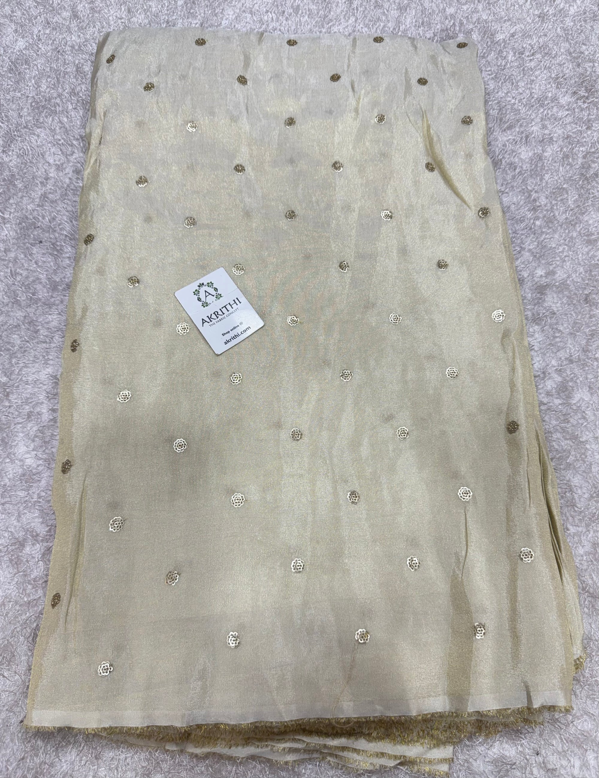 Sequins on dyeable crepe tissue fabric