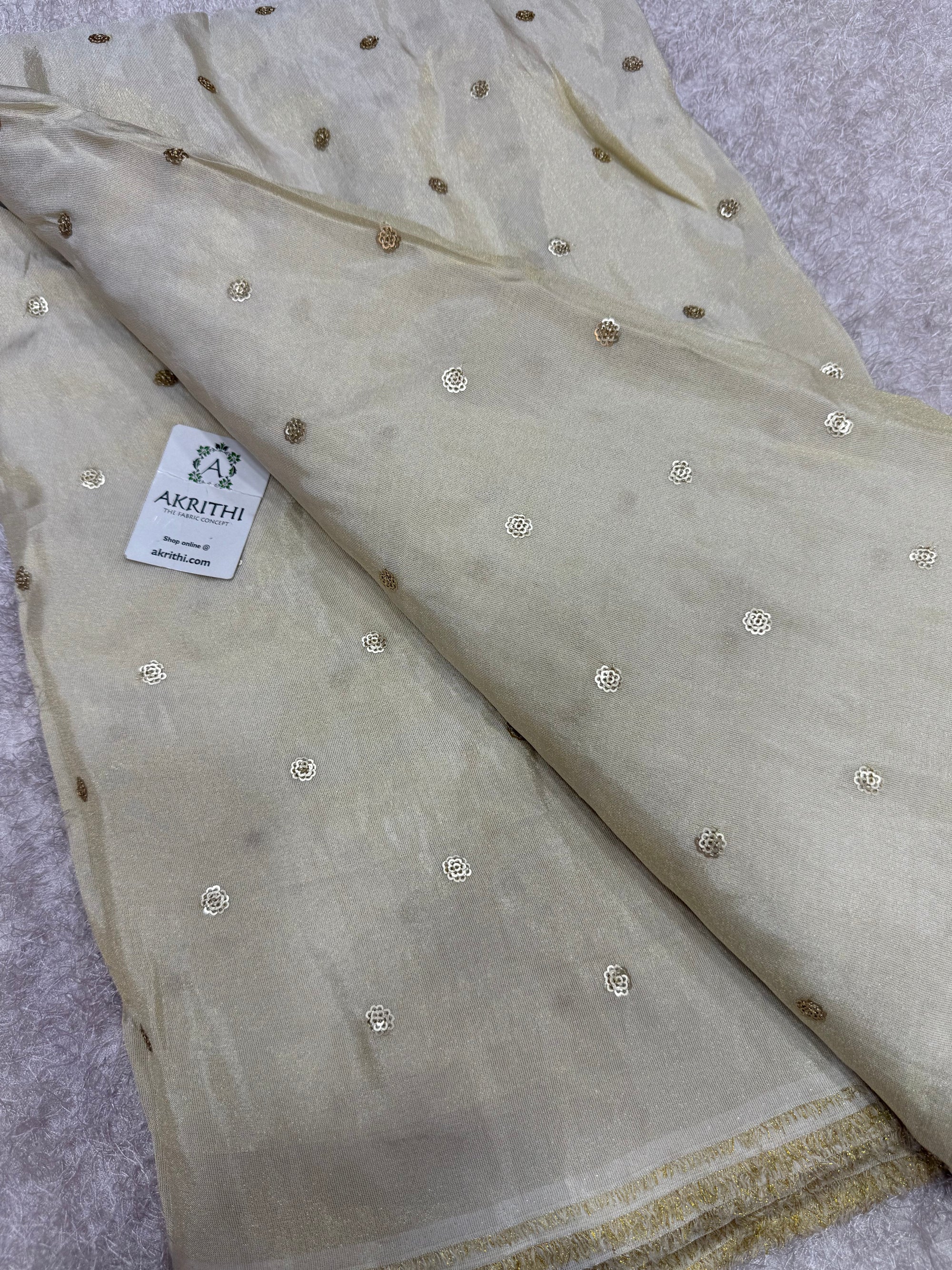 Sequins on dyeable crepe tissue fabric