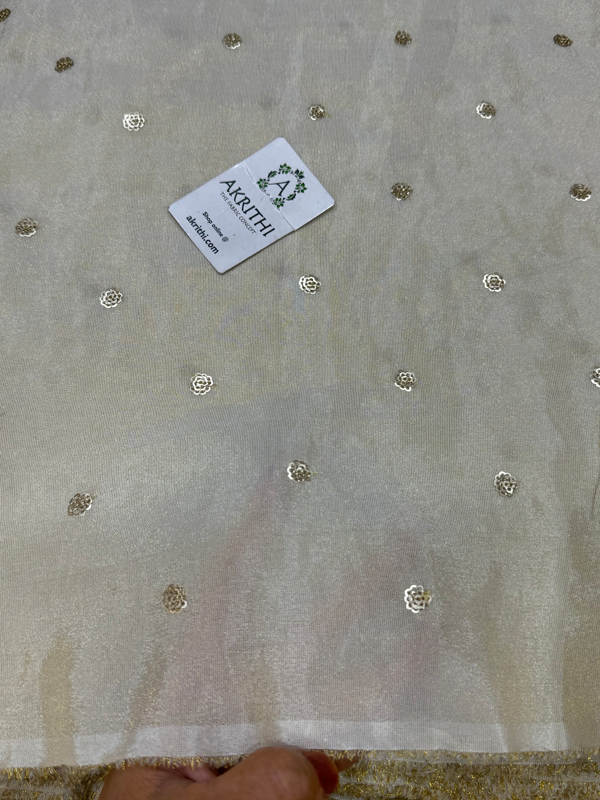 Sequins on dyeable crepe tissue fabric