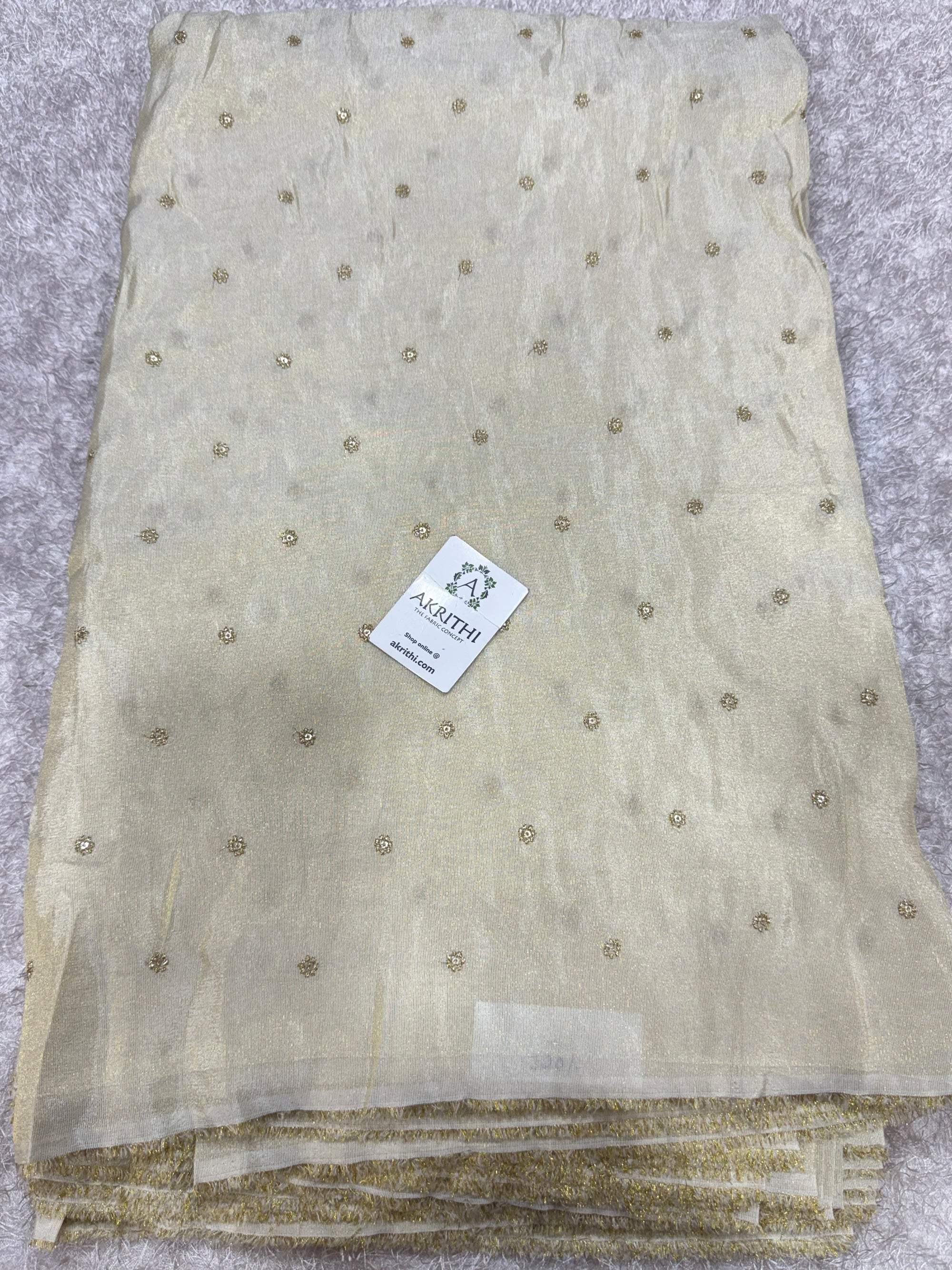 Sequins on dyeable crepe tissue fabric
