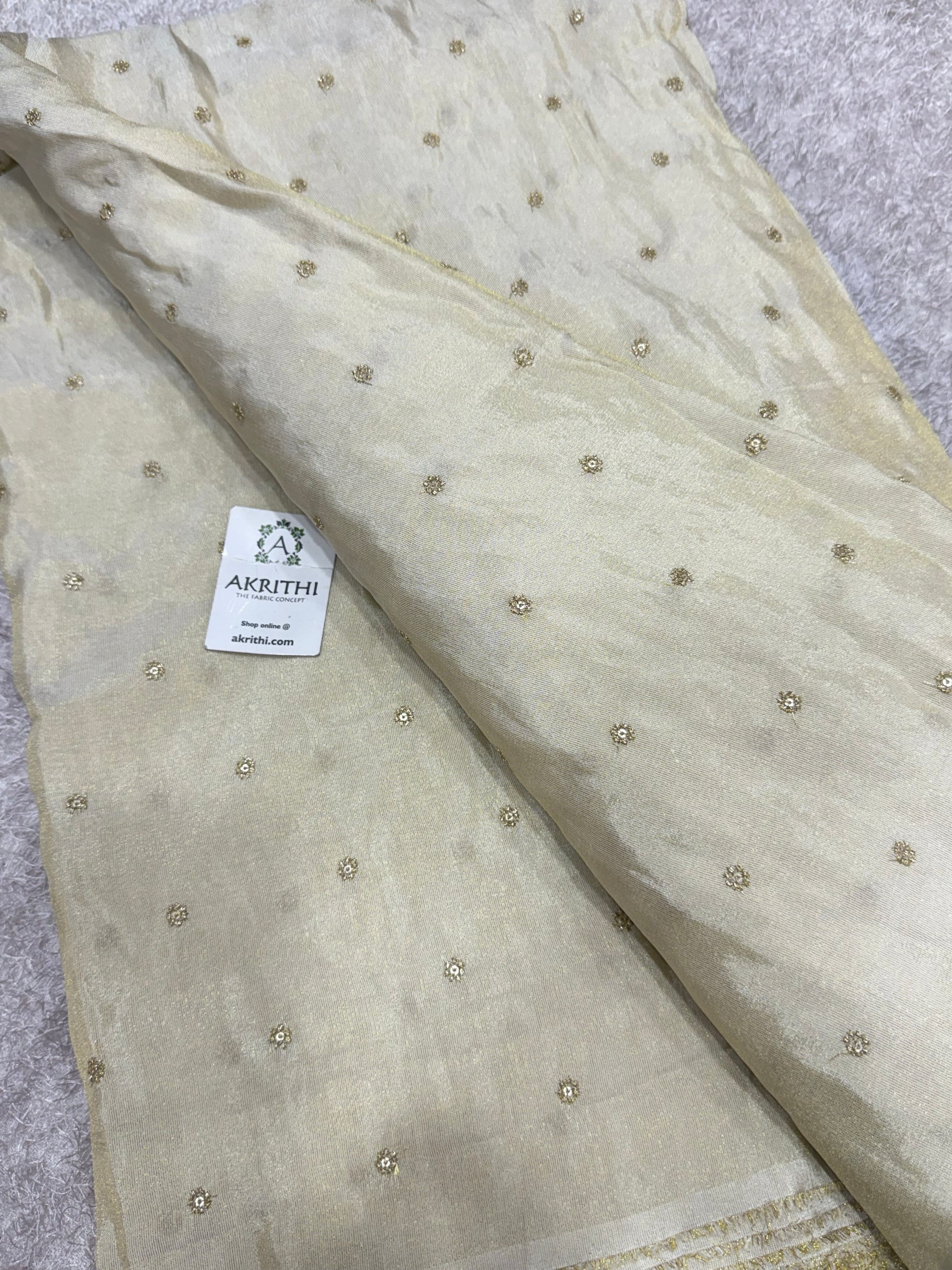 Sequins on dyeable crepe tissue fabric