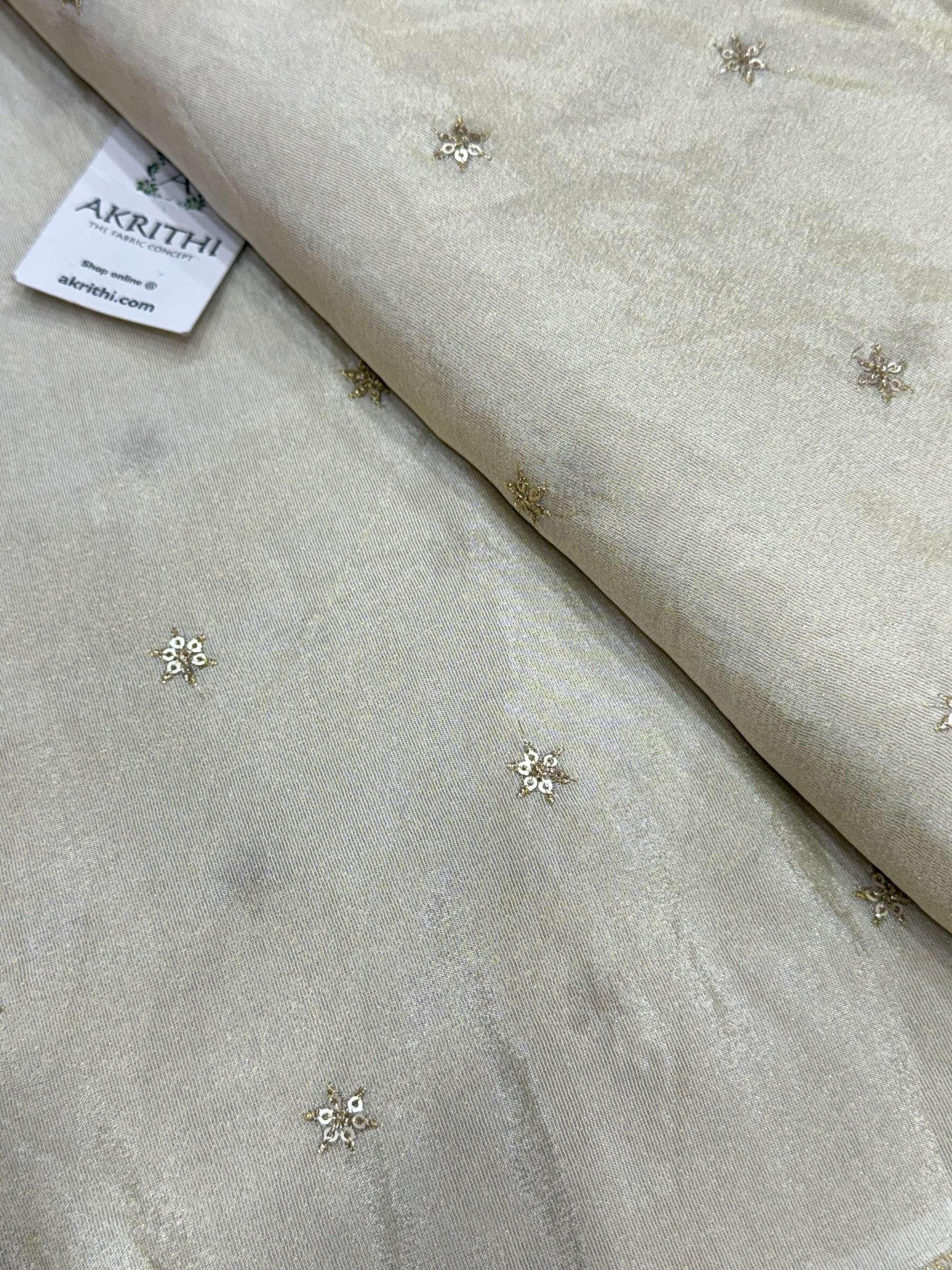 Sequins on dyeable crepe tissue fabric