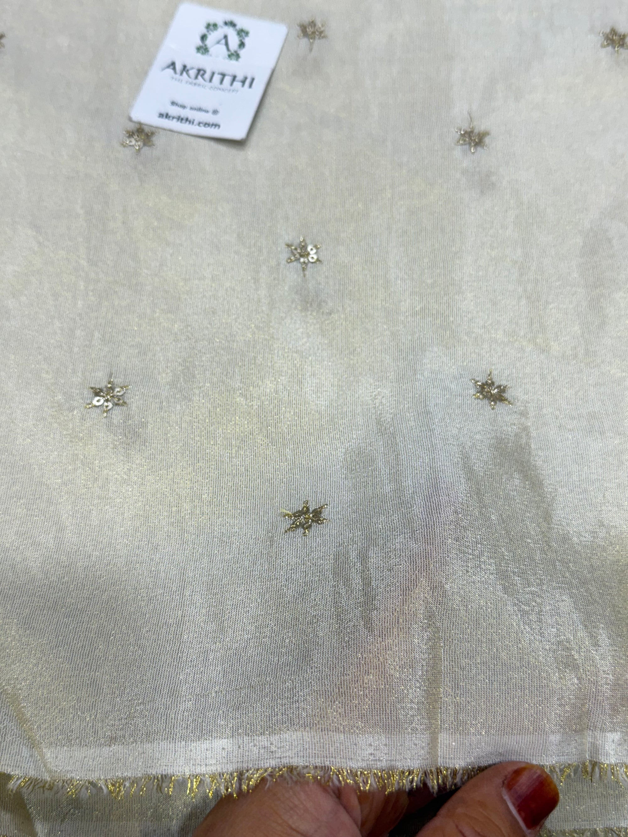 Sequins on dyeable crepe tissue fabric