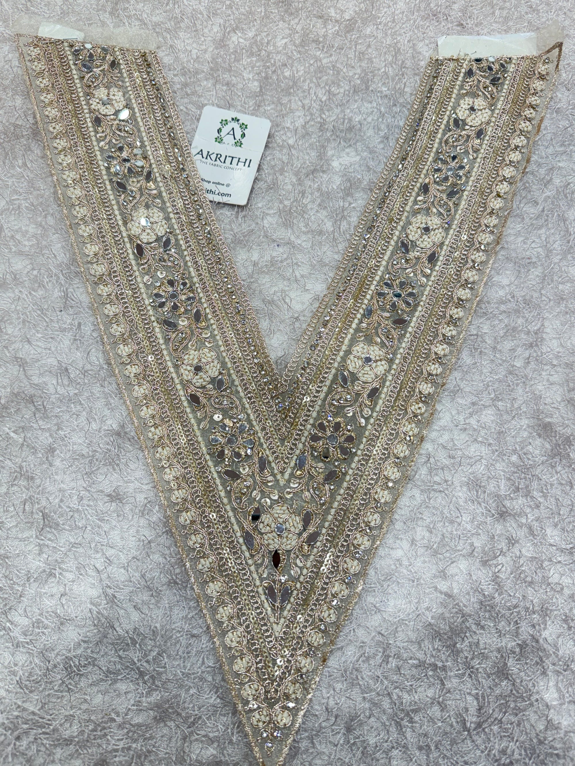 Embroidered neck piece