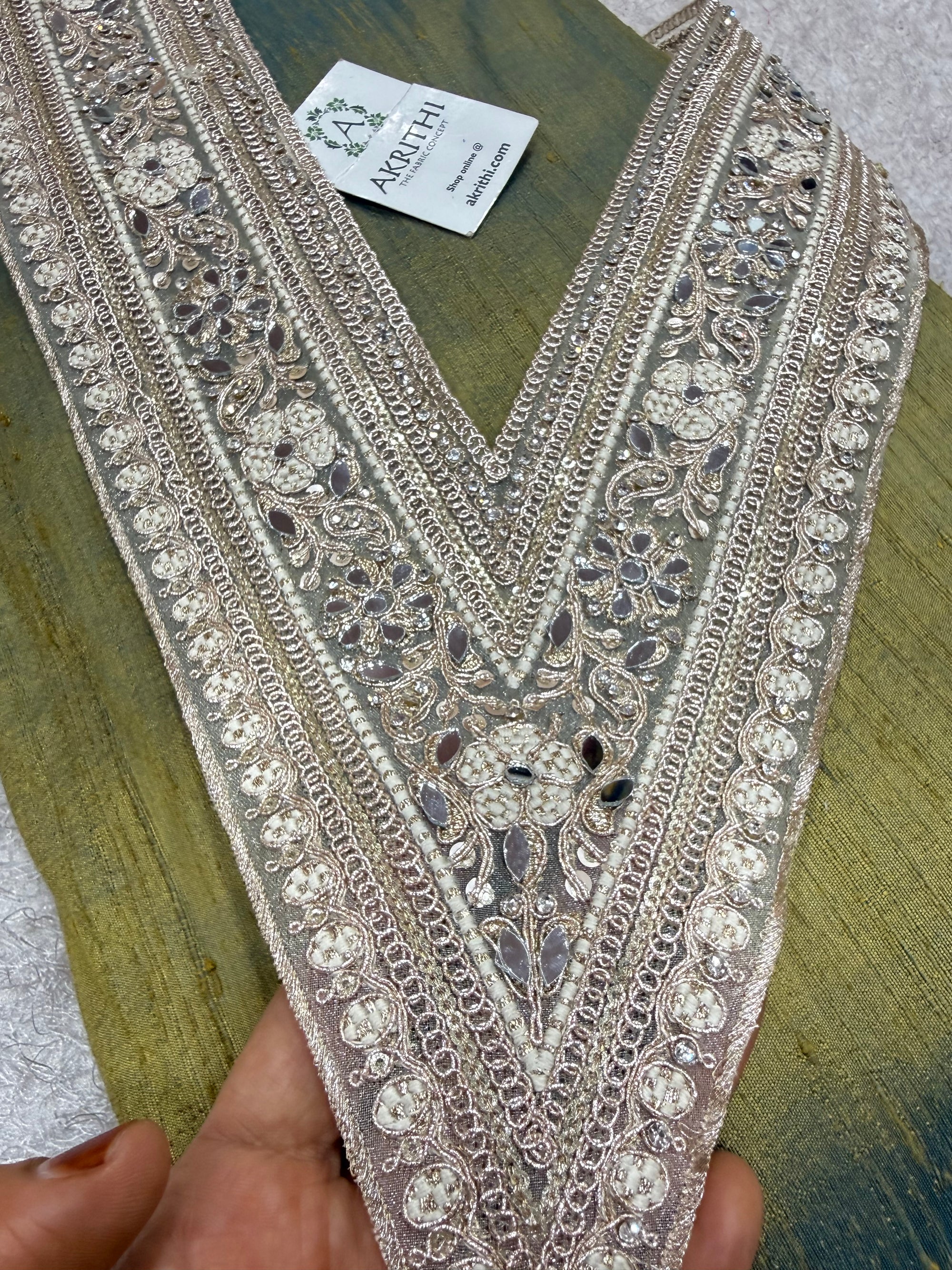 Embroidered neck piece
