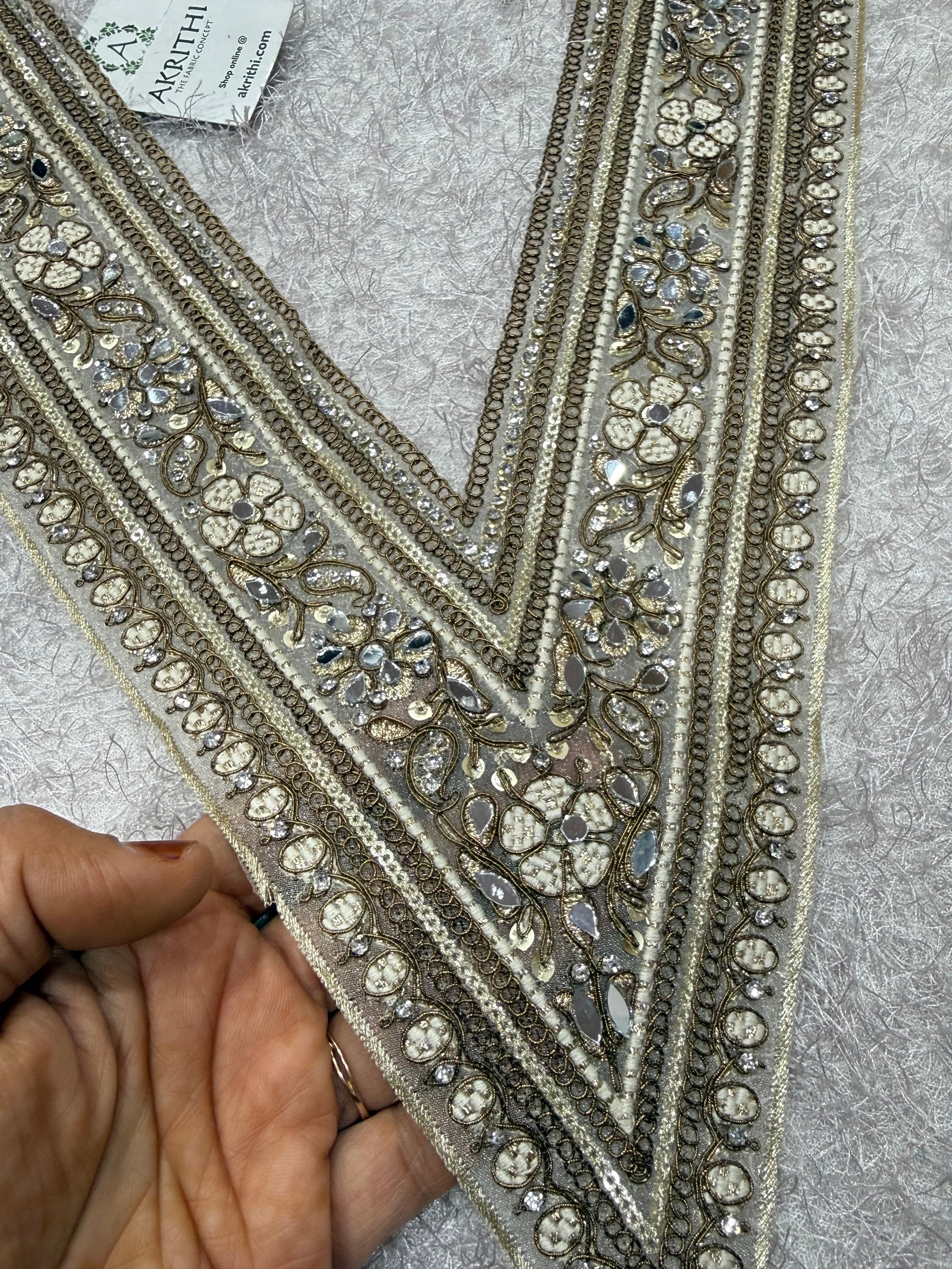 Embroidered neck piece