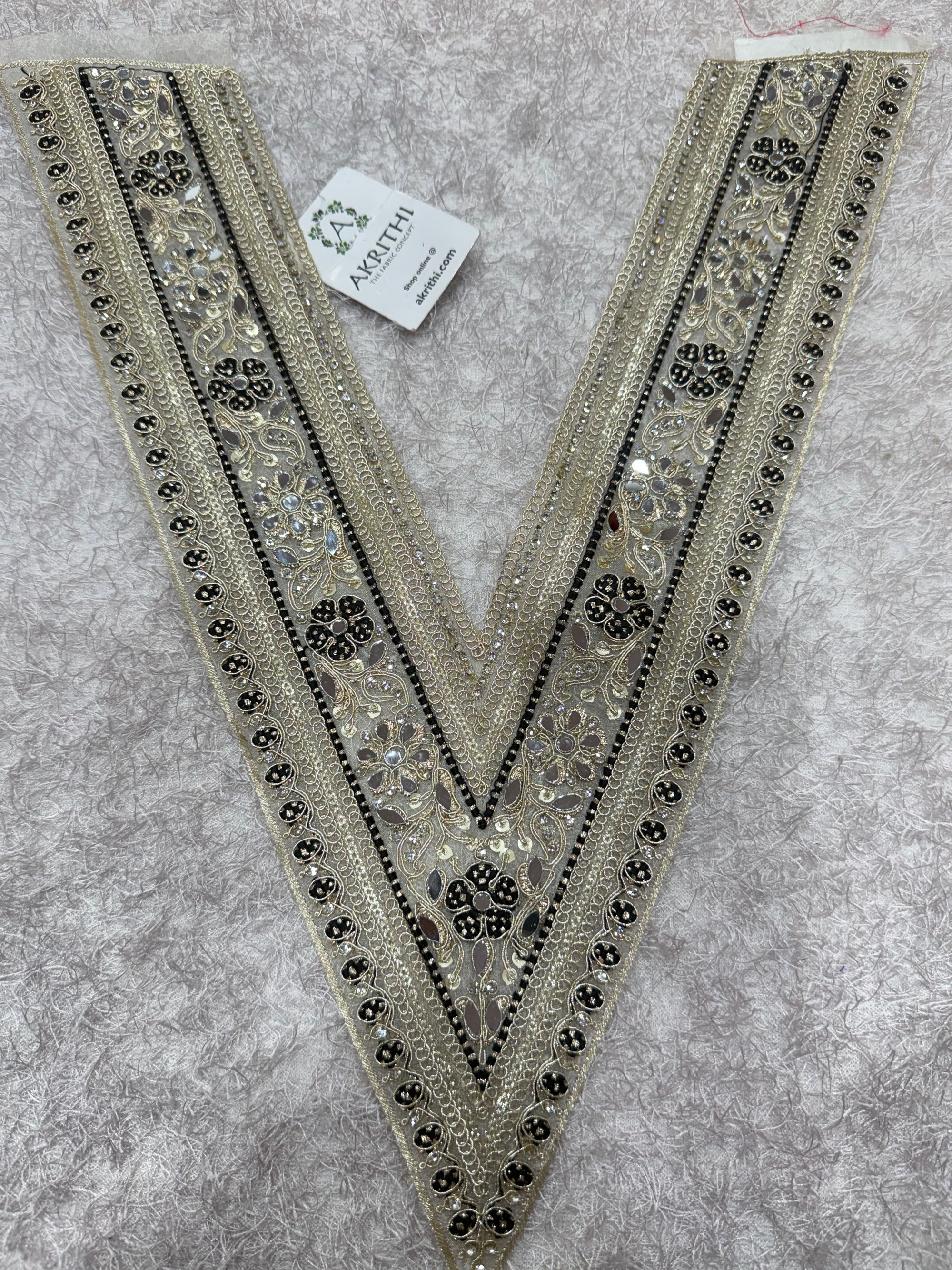 Embroidered neck piece
