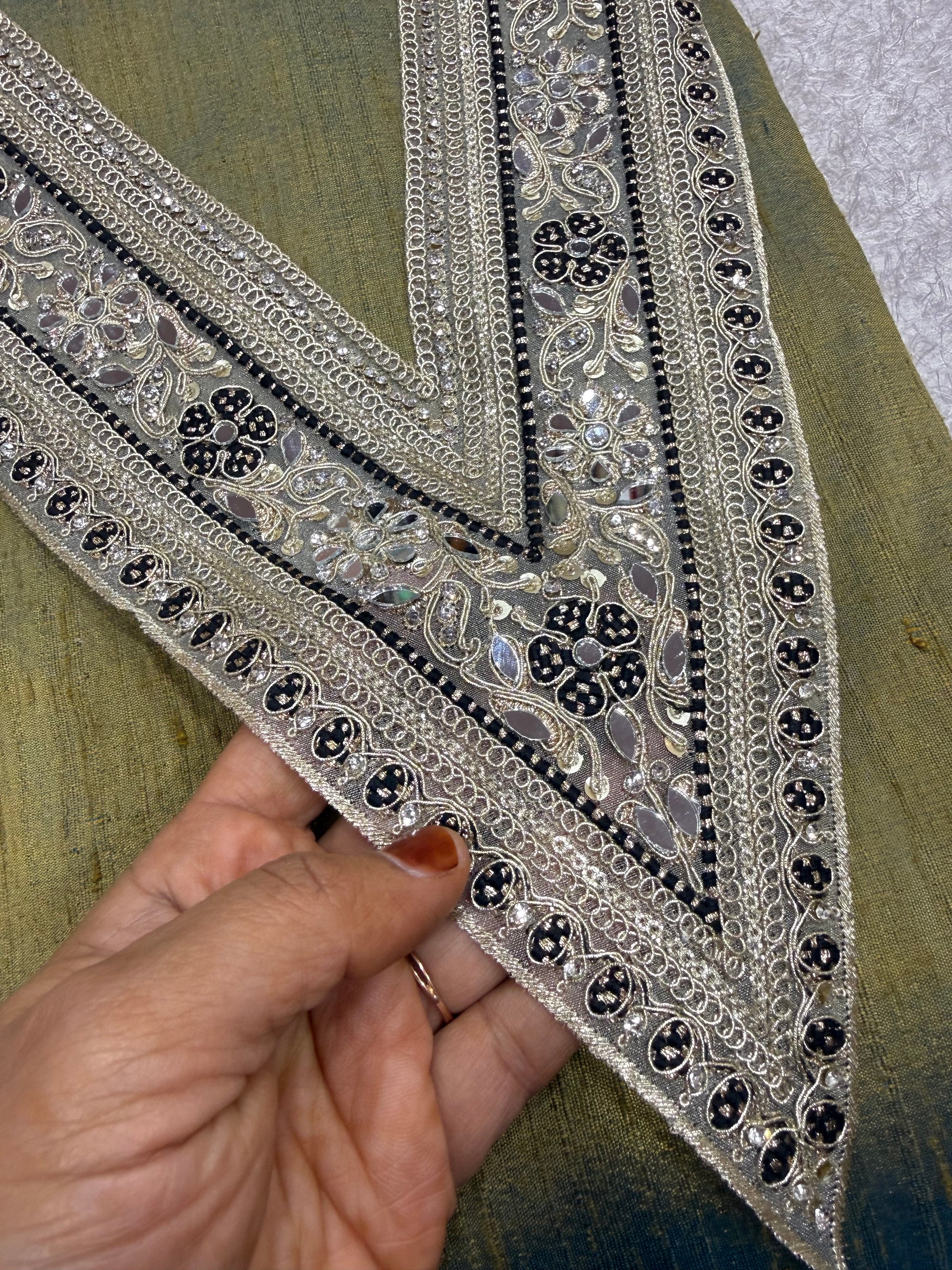 Embroidered neck piece