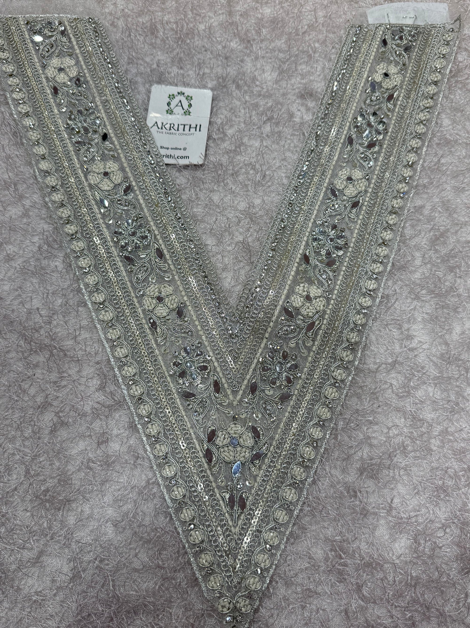 Embroidered neck piece