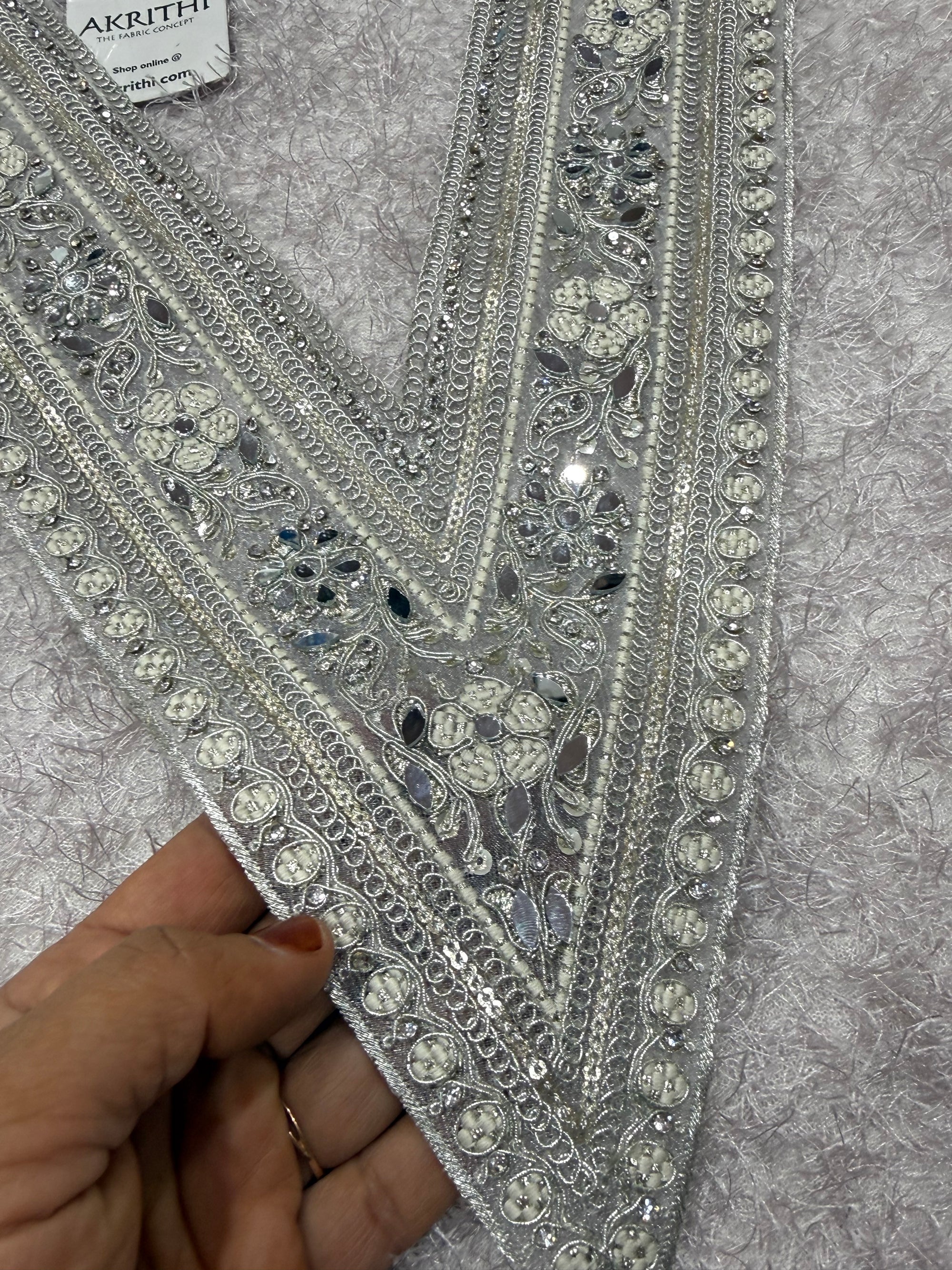 Embroidered neck piece