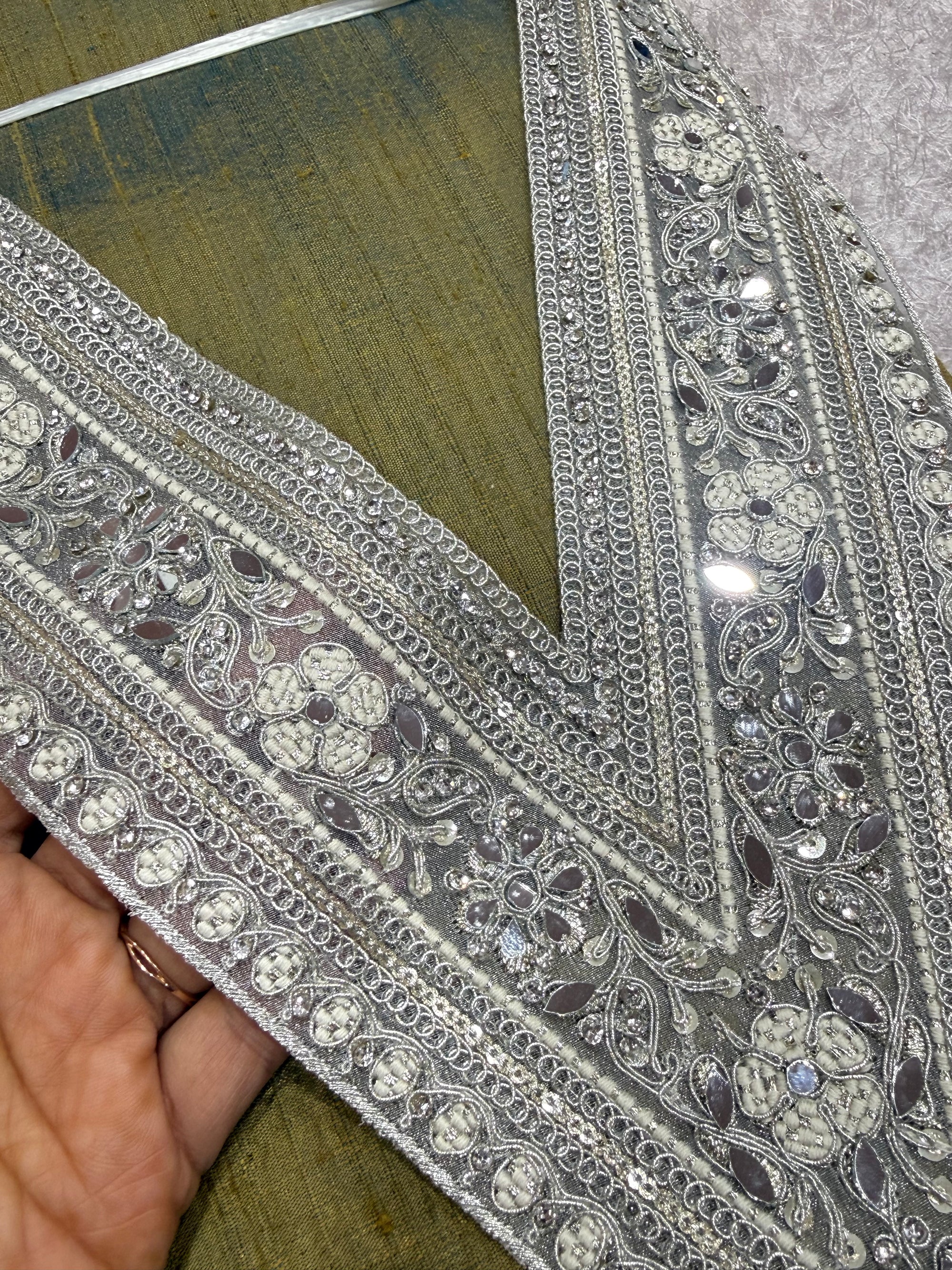 Embroidered neck piece