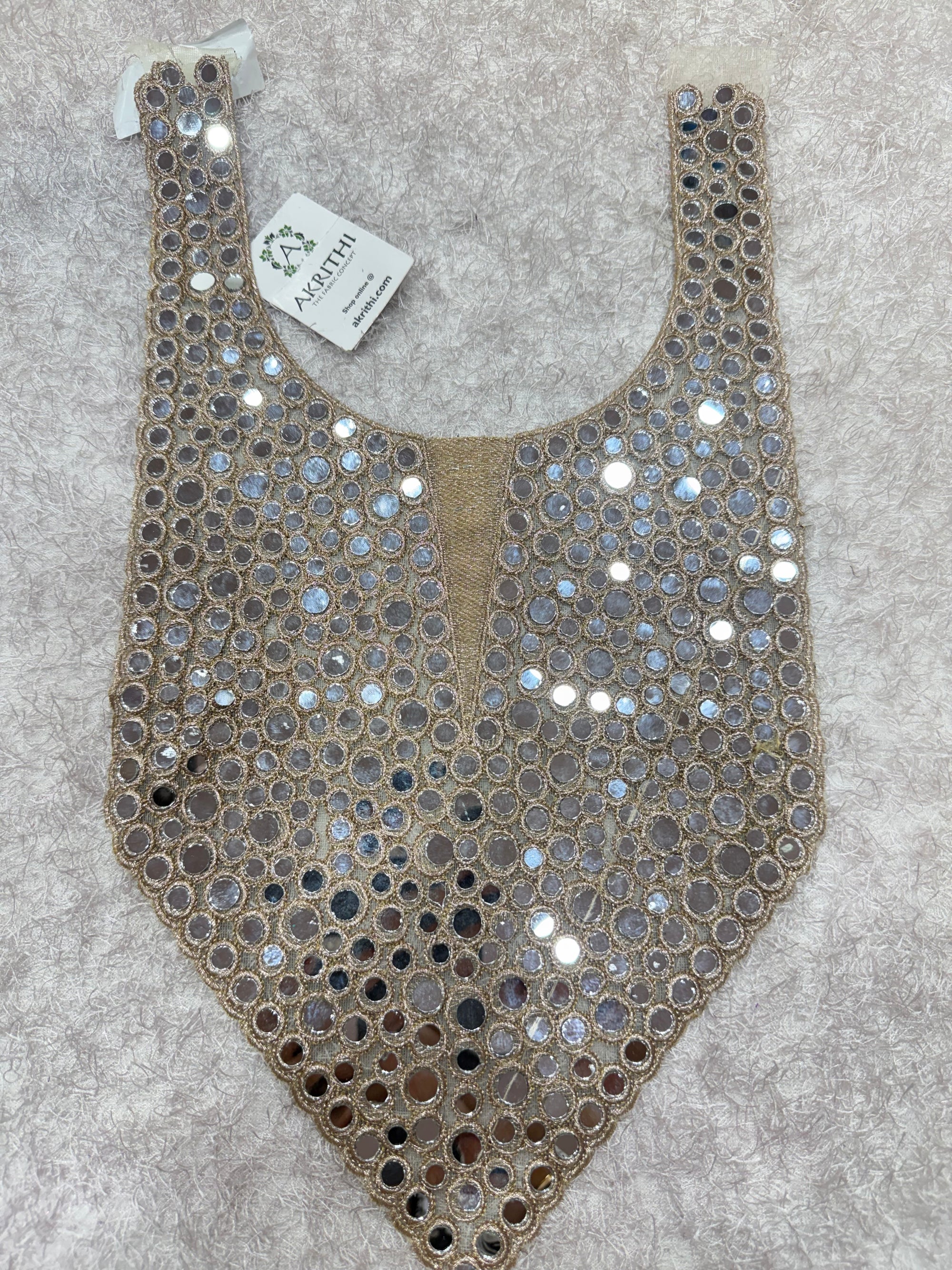 Embroidered neck piece